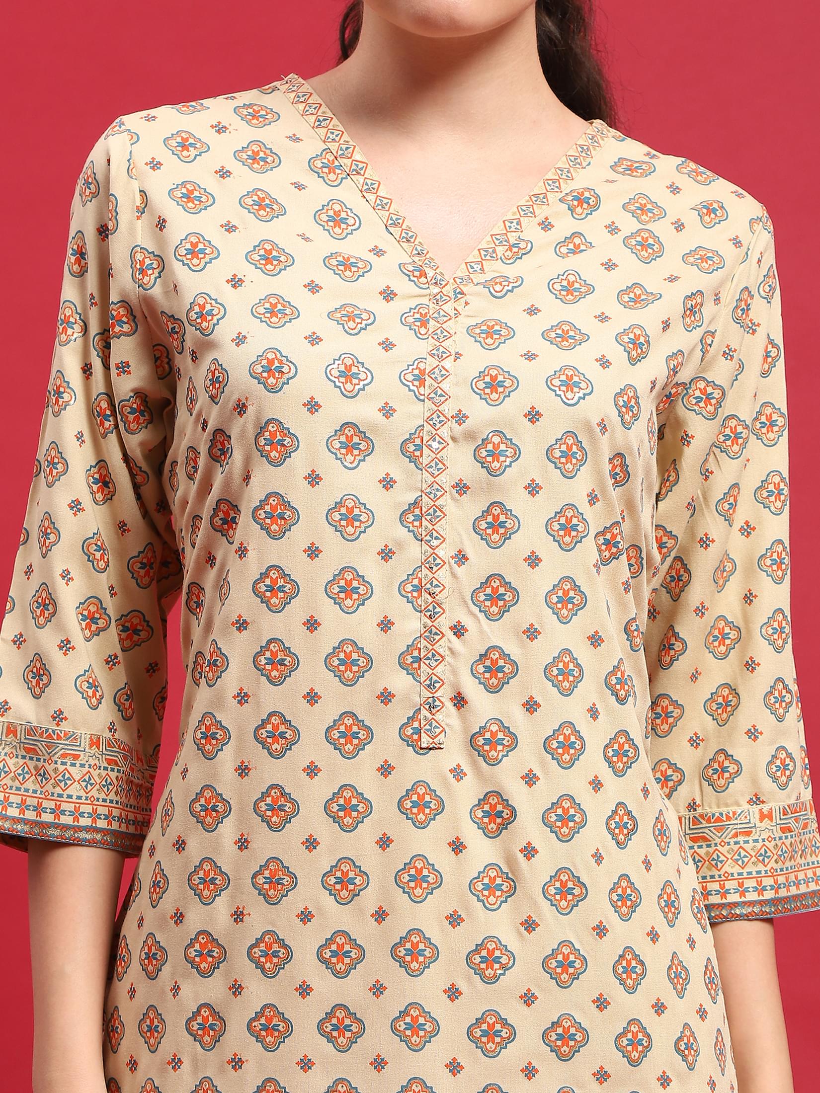 Indiessence Women Liva (Rayon) Beige Ornamental Print Kurta With Trouser.