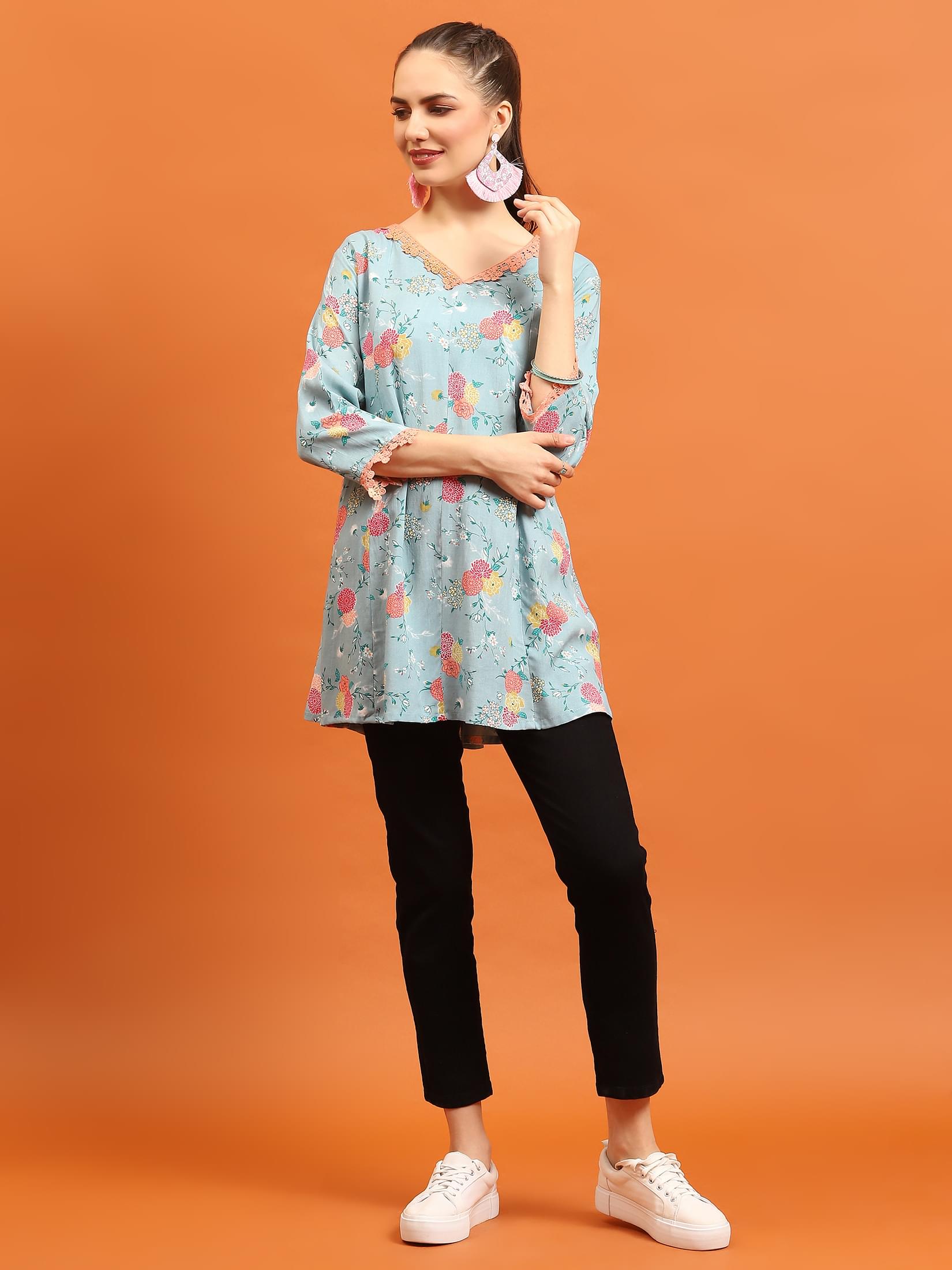 Women Sea Blue Floral Printed Tunic.