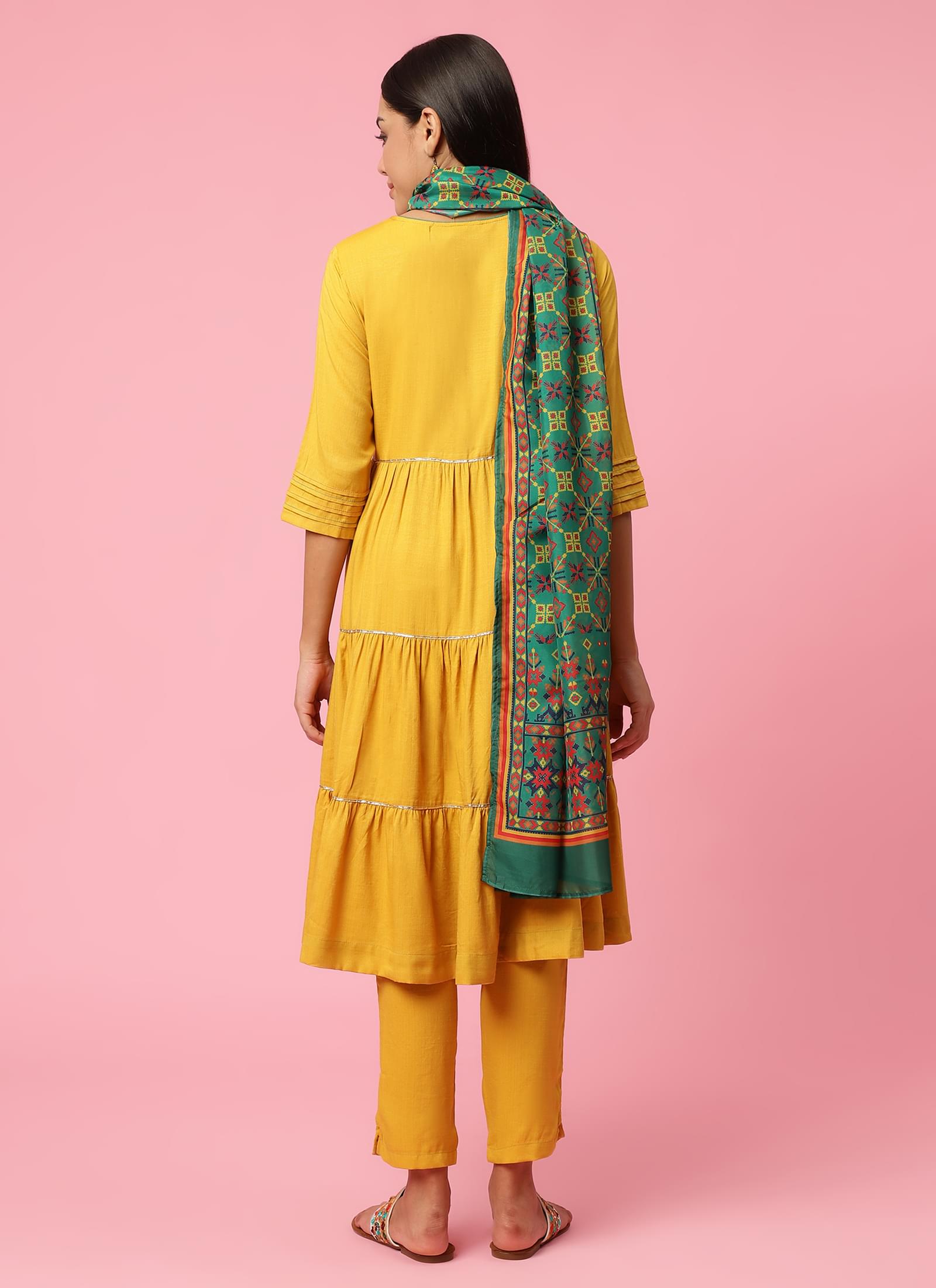 Women Mustard Embroidered Kurta Trouser Dupatta.