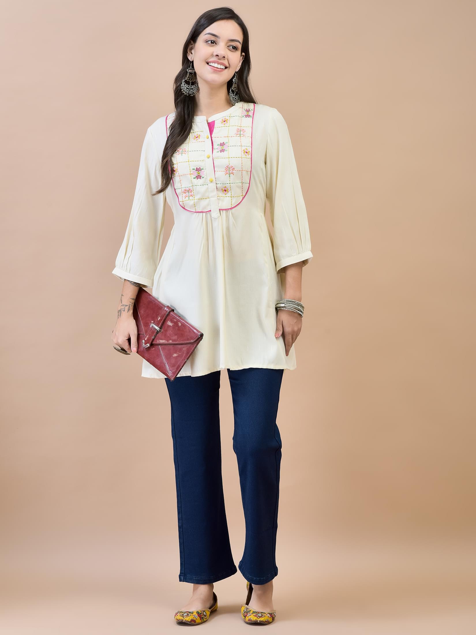 Women Liva (Rayon) Off White Embroidered Tunic.