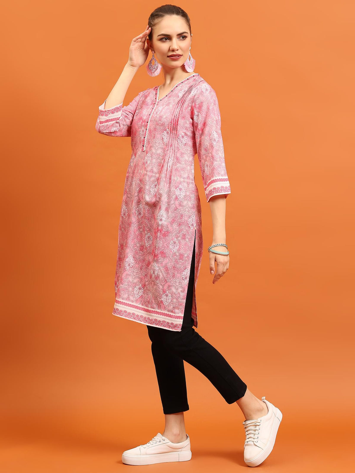 Women Pink Ornamental Printed Kurti.