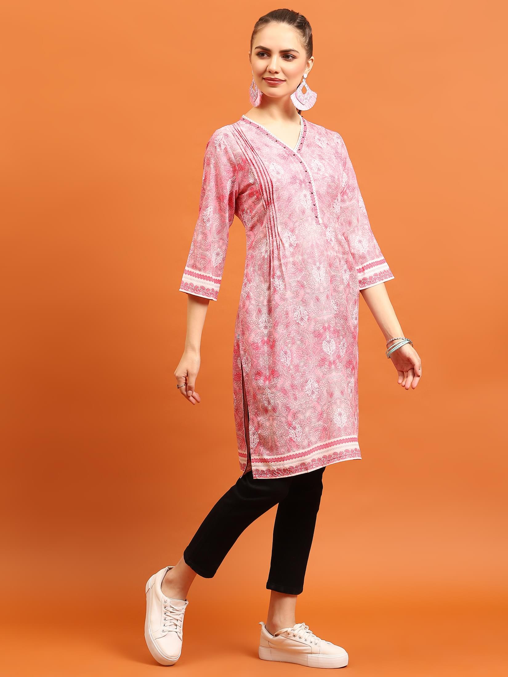 Women Pink Ornamental Printed Kurti.