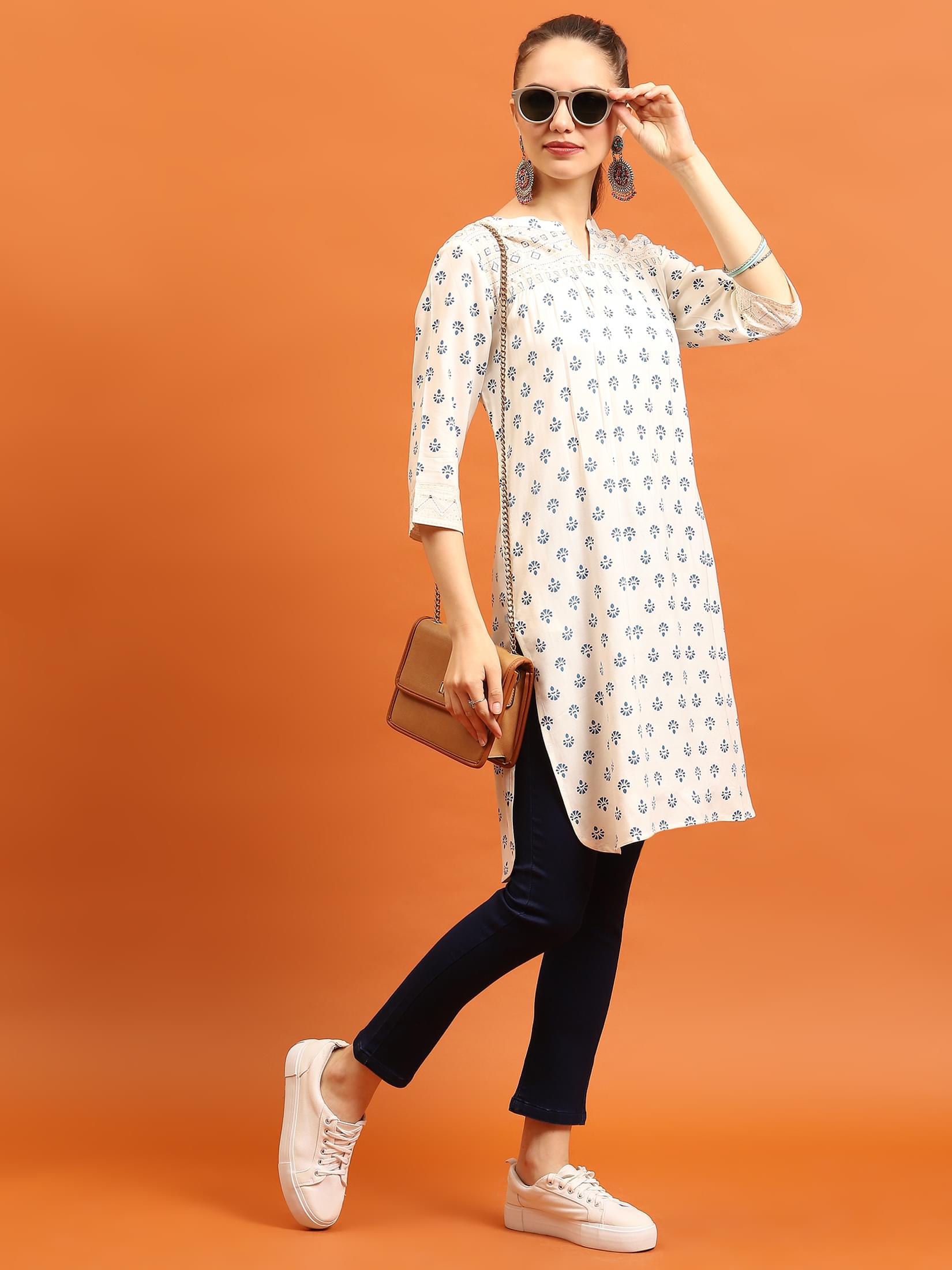 Women Off White Ornamental Printed Kurti.