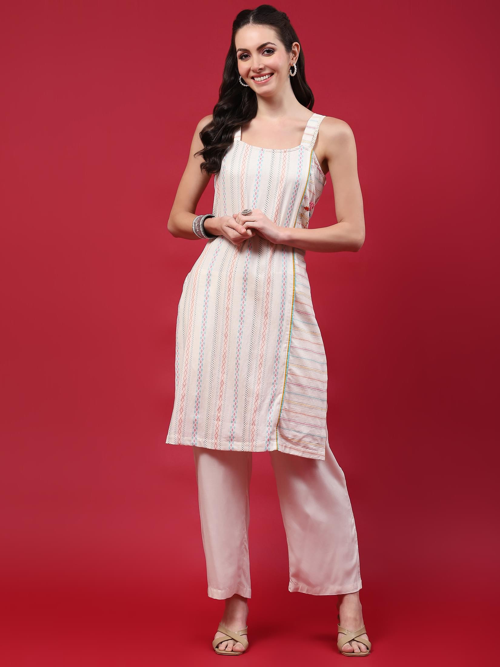 Women Off White Stripe Printed Kurta With Comfort Pant.