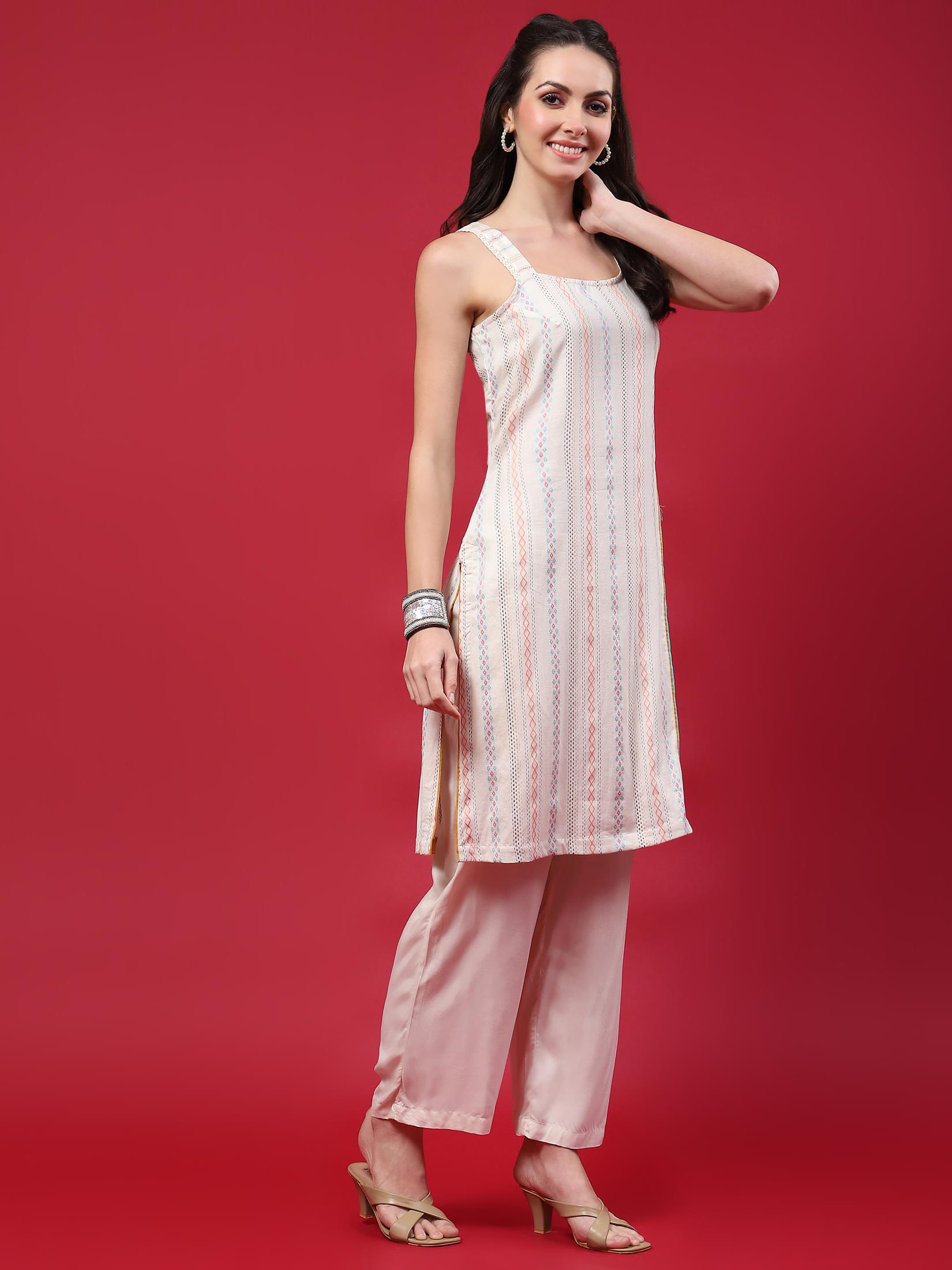 Women Off White Stripe Printed Kurta With Comfort Pant.