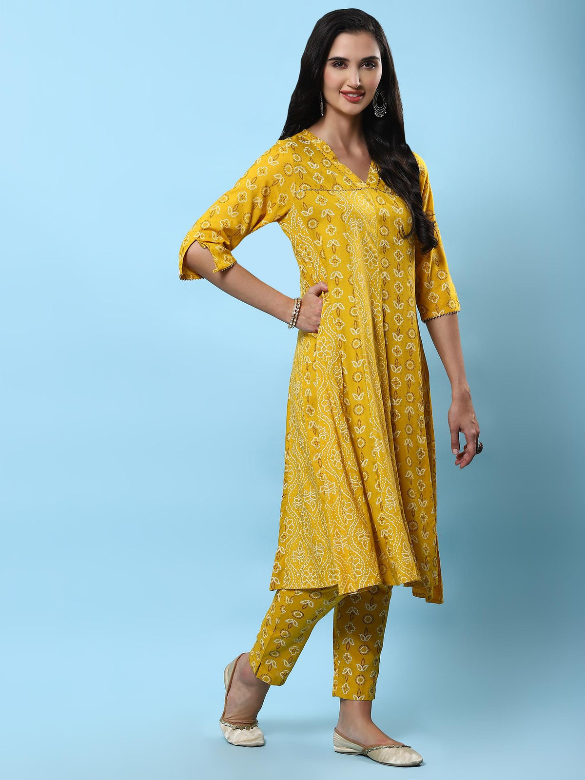 Women Mustard Ornamental Printed Kurta With Trouser.