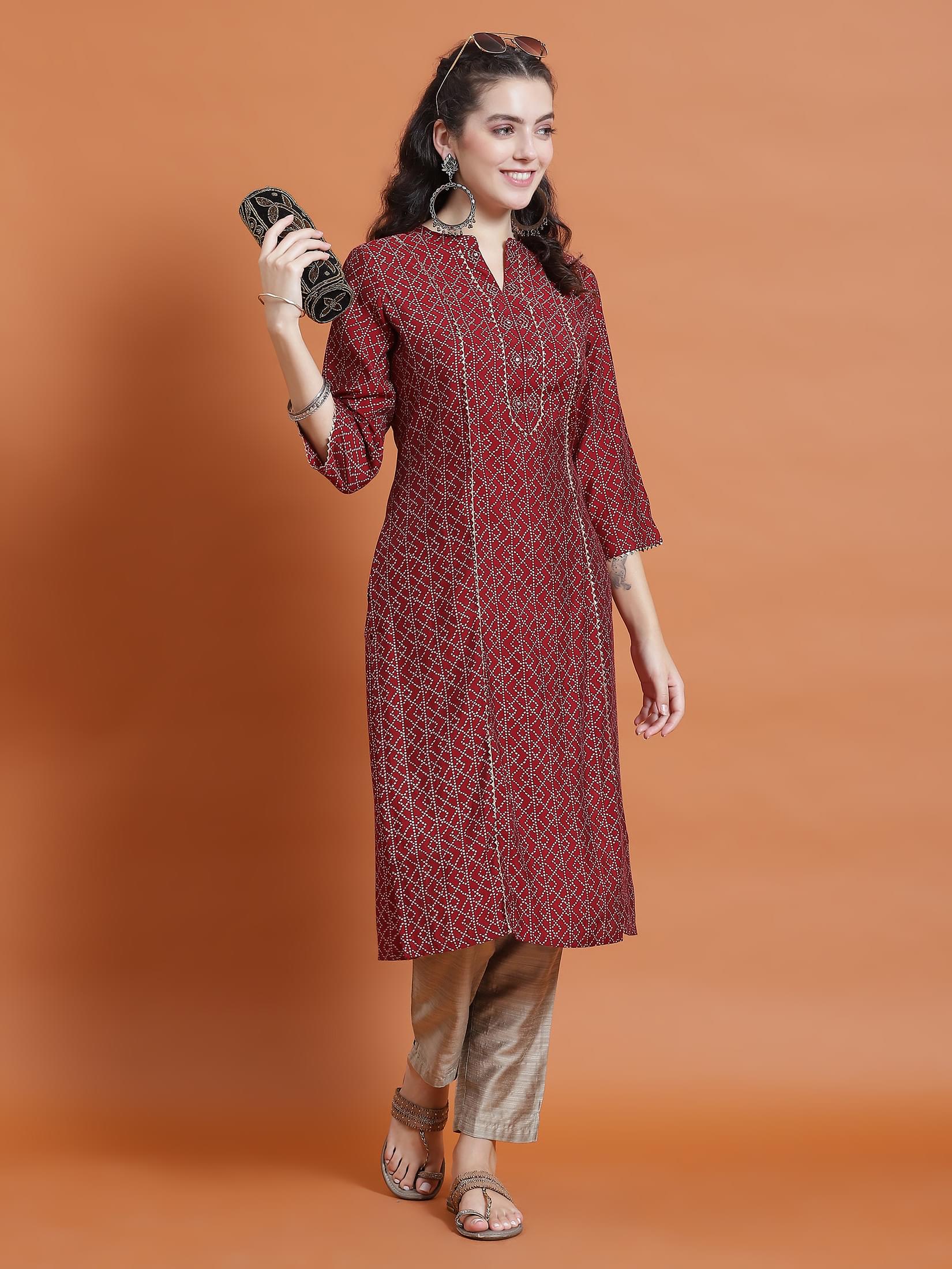 Women Maroon Geometric Print Kurta With Trouser.