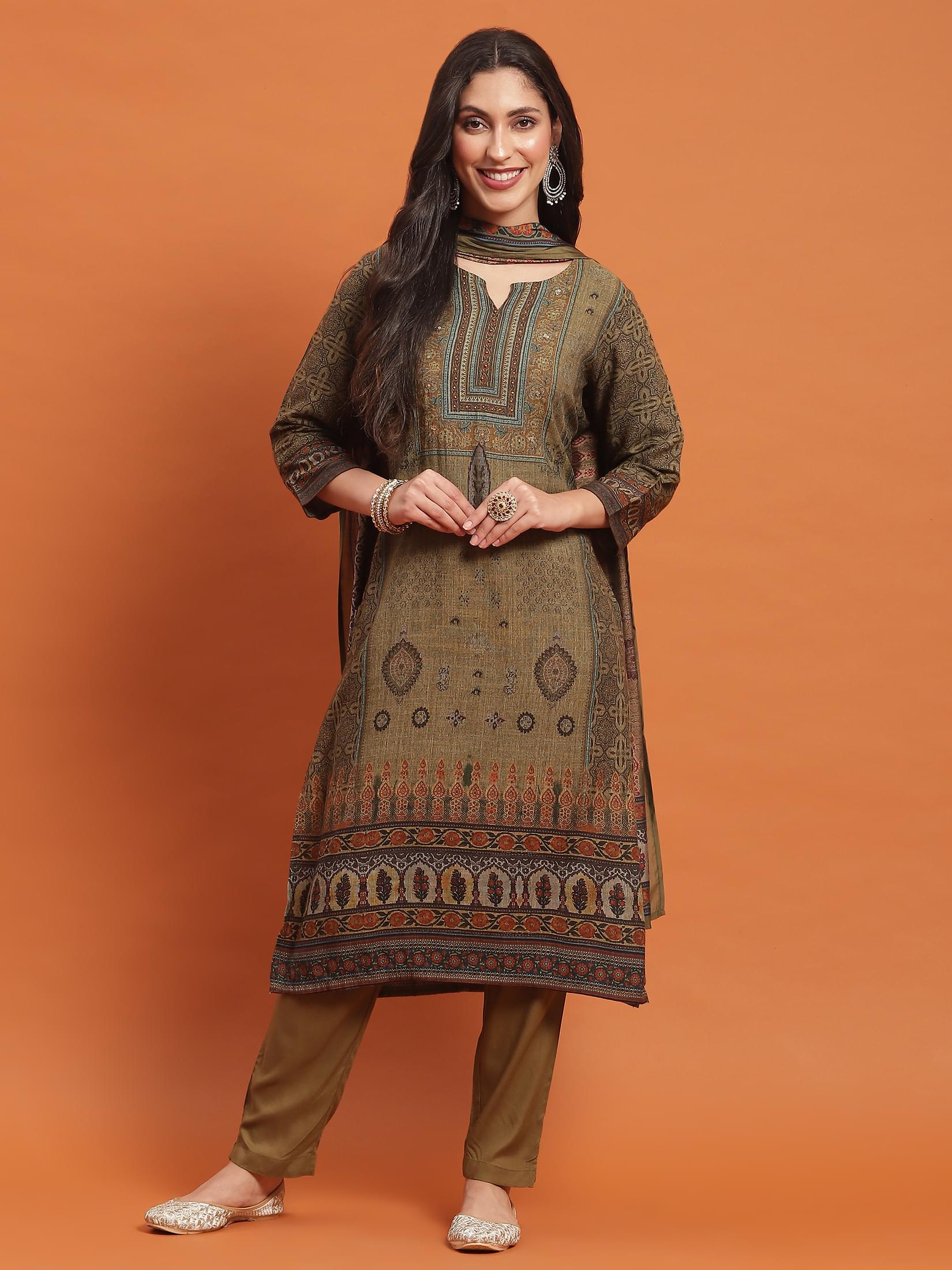 Women Green Ornamental Print Kurta Trouser Dupatta.