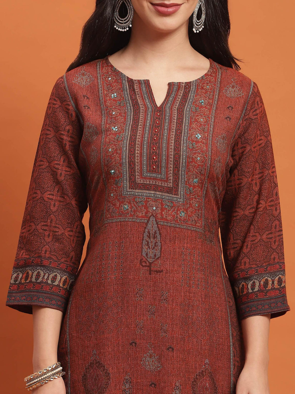 Women Rust Ornamental Print Kurta Trouser Dupatta.