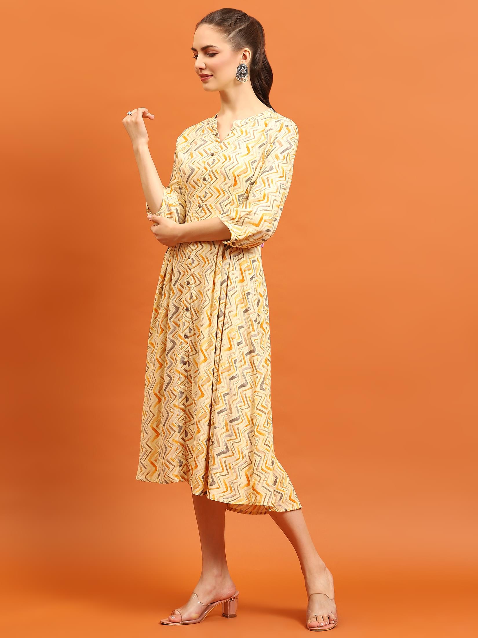 Women Yellow Printed Dress.