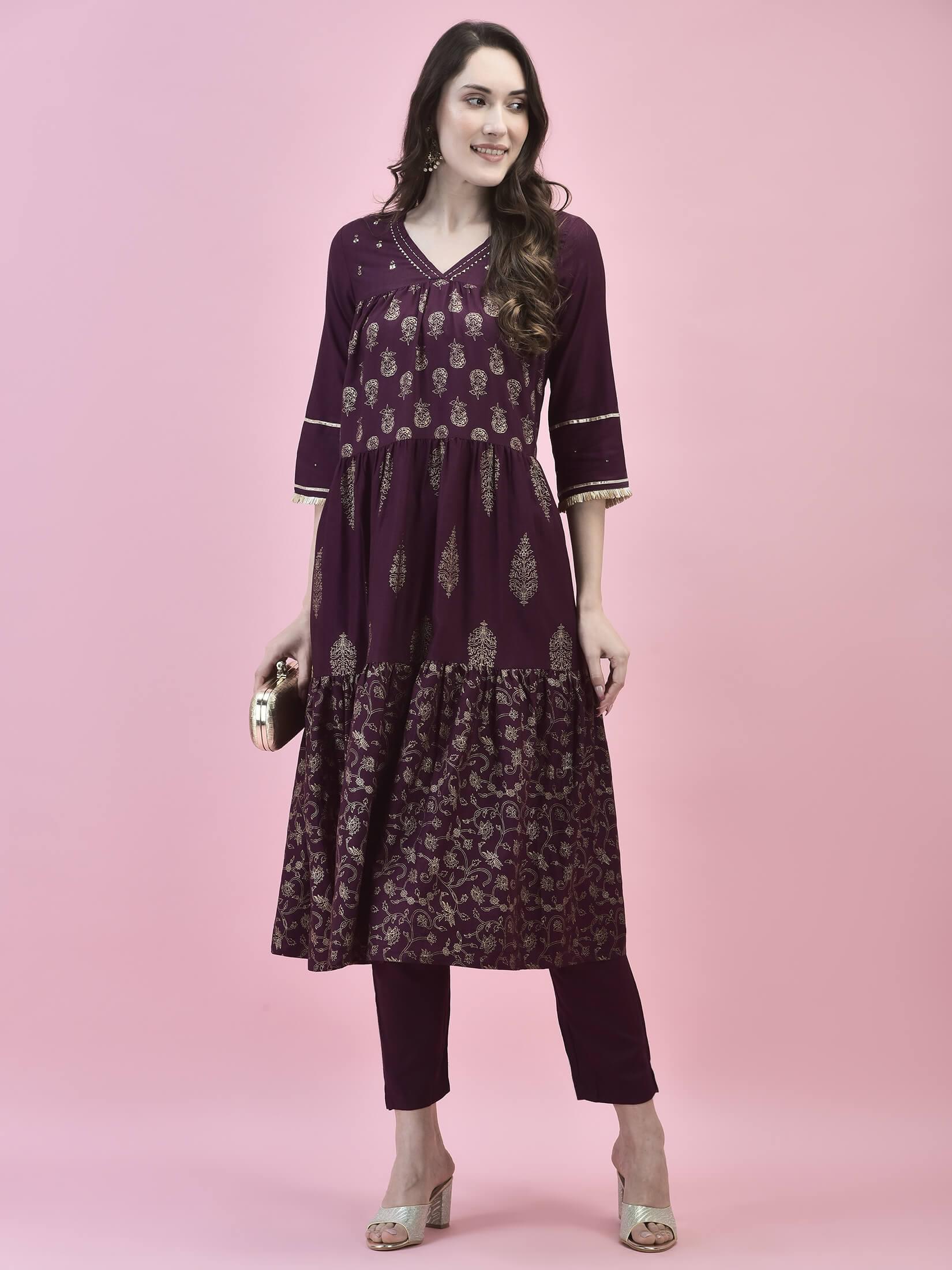 Women Poly Viscose Purple Printed Kurta With Trouser.