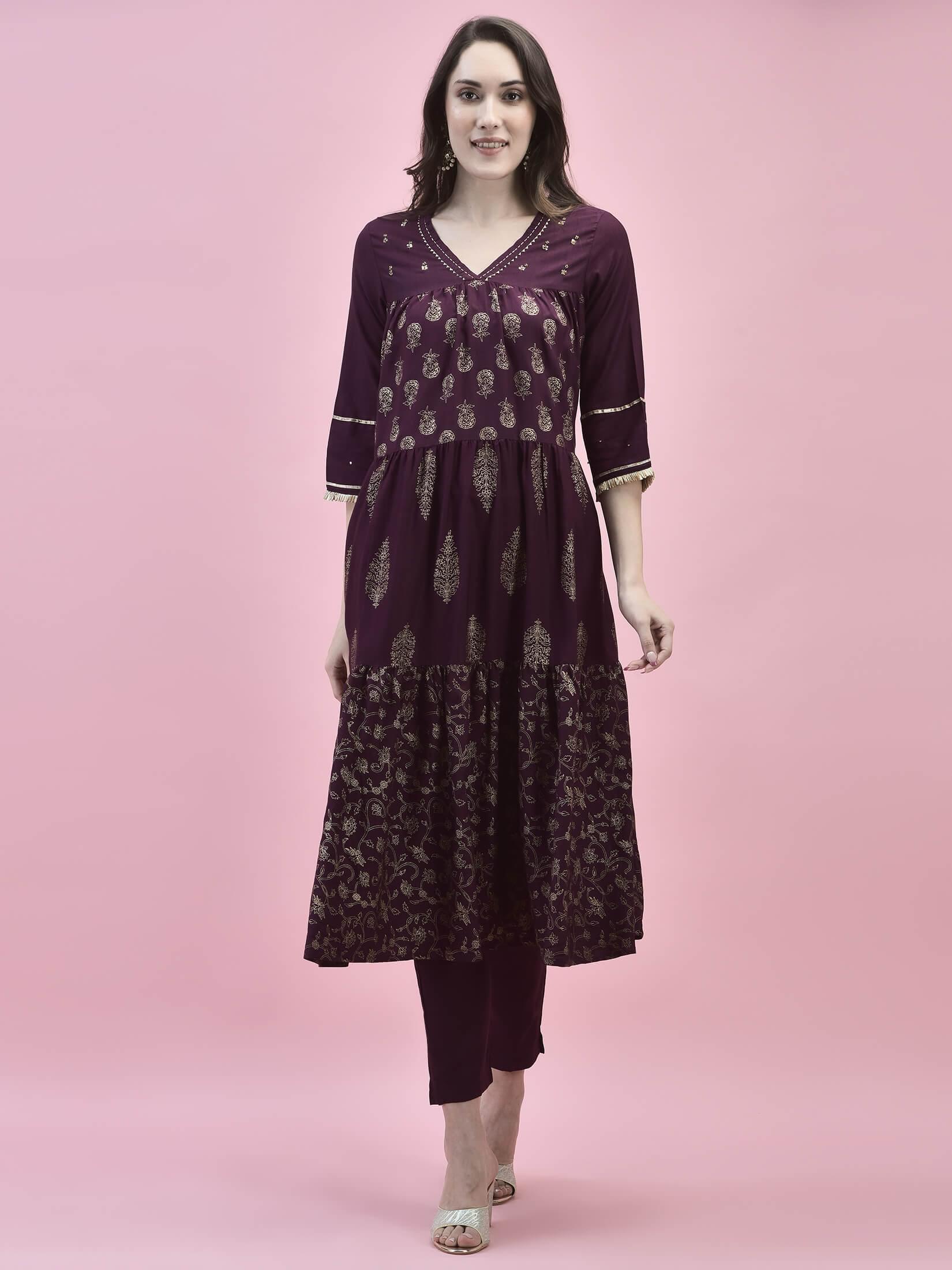 Women Poly Viscose Purple Printed Kurta With Trouser.