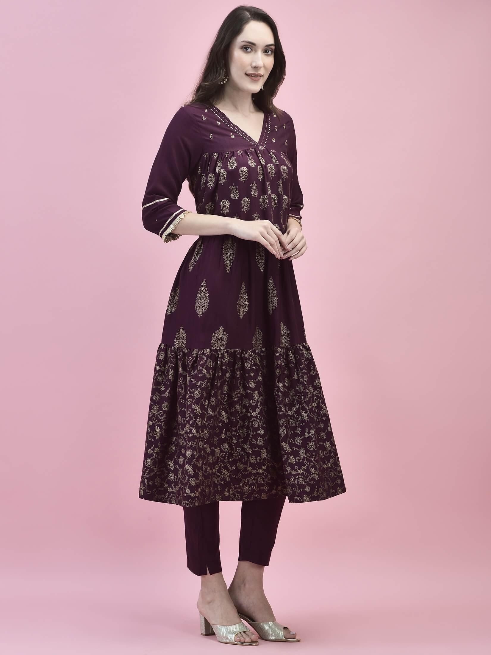 Women Poly Viscose Purple Printed Kurta With Trouser.