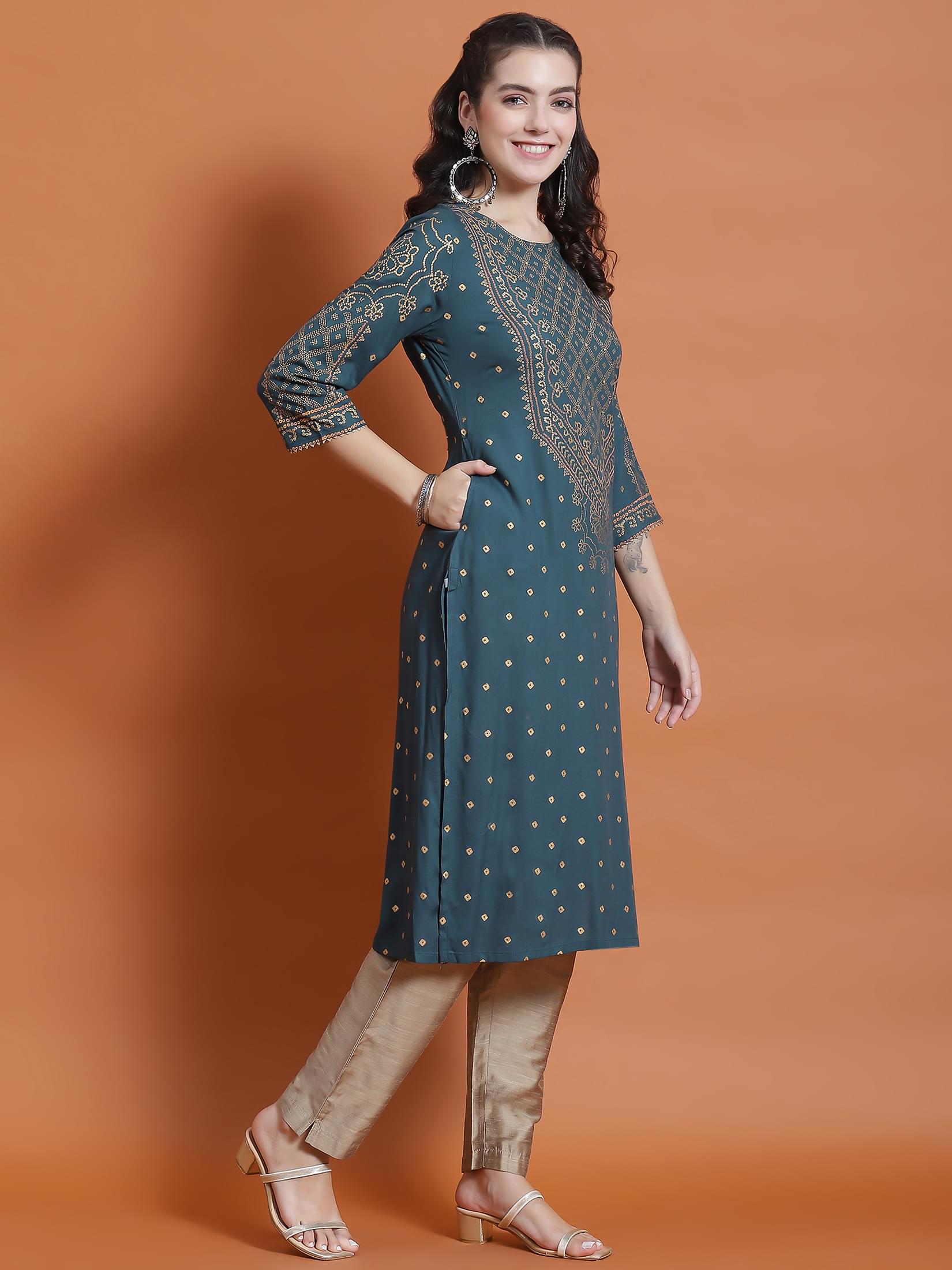 Women Teal Ornamental Print Kurta.