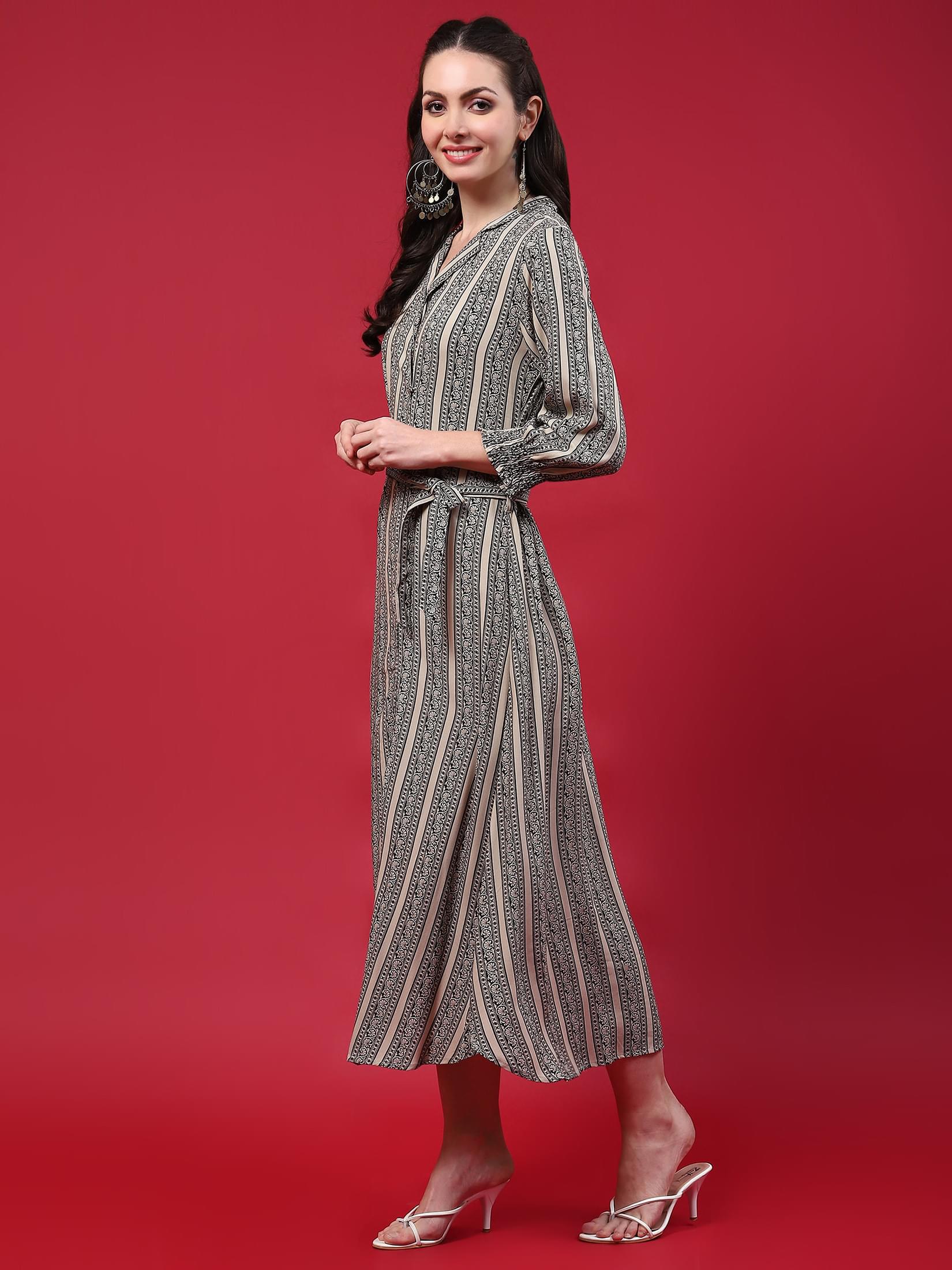 Women Beige Border Printed Dress.