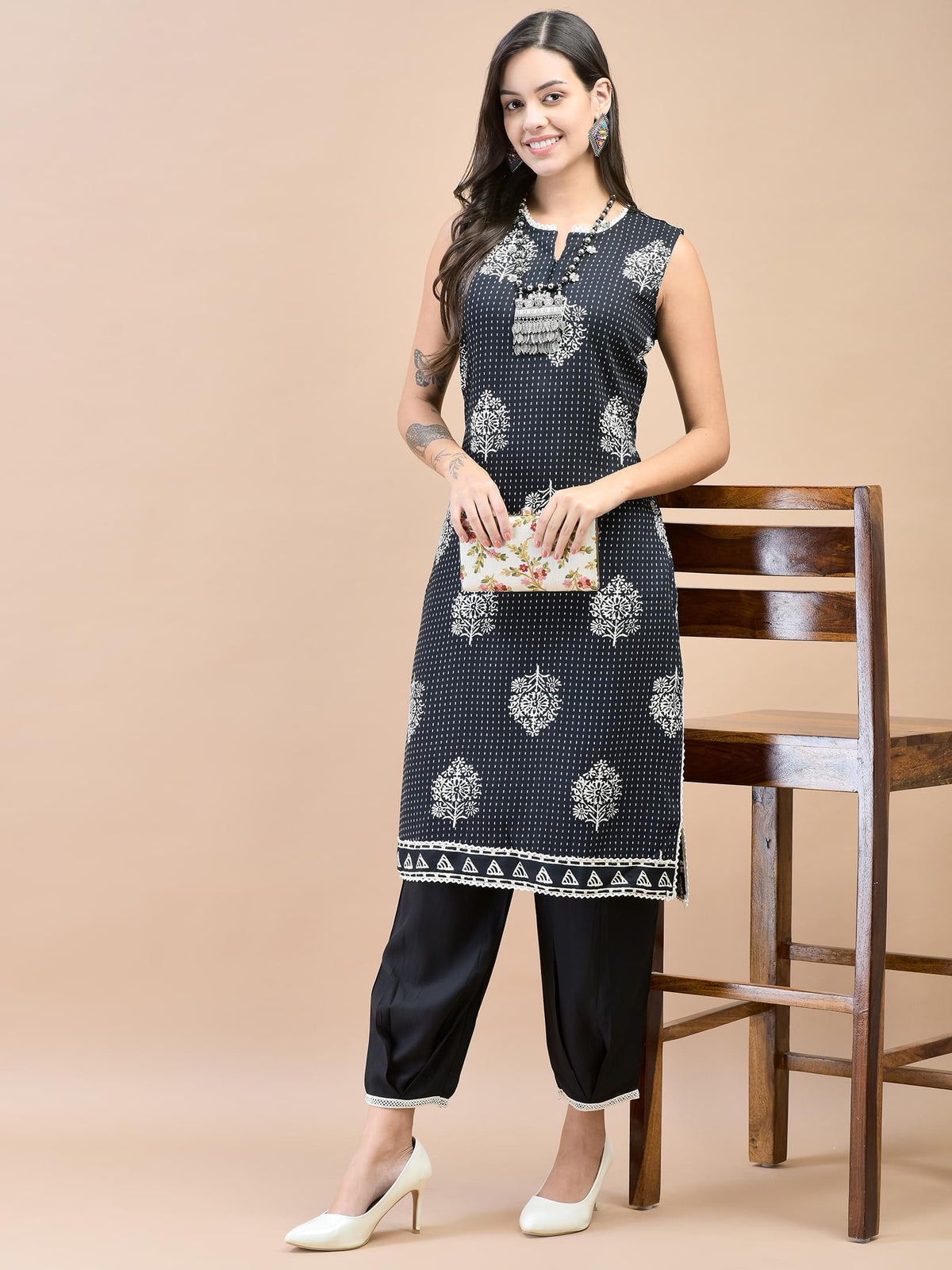 Women Liva (Rayon) Black Floral Print Kurta With Harem Pant.