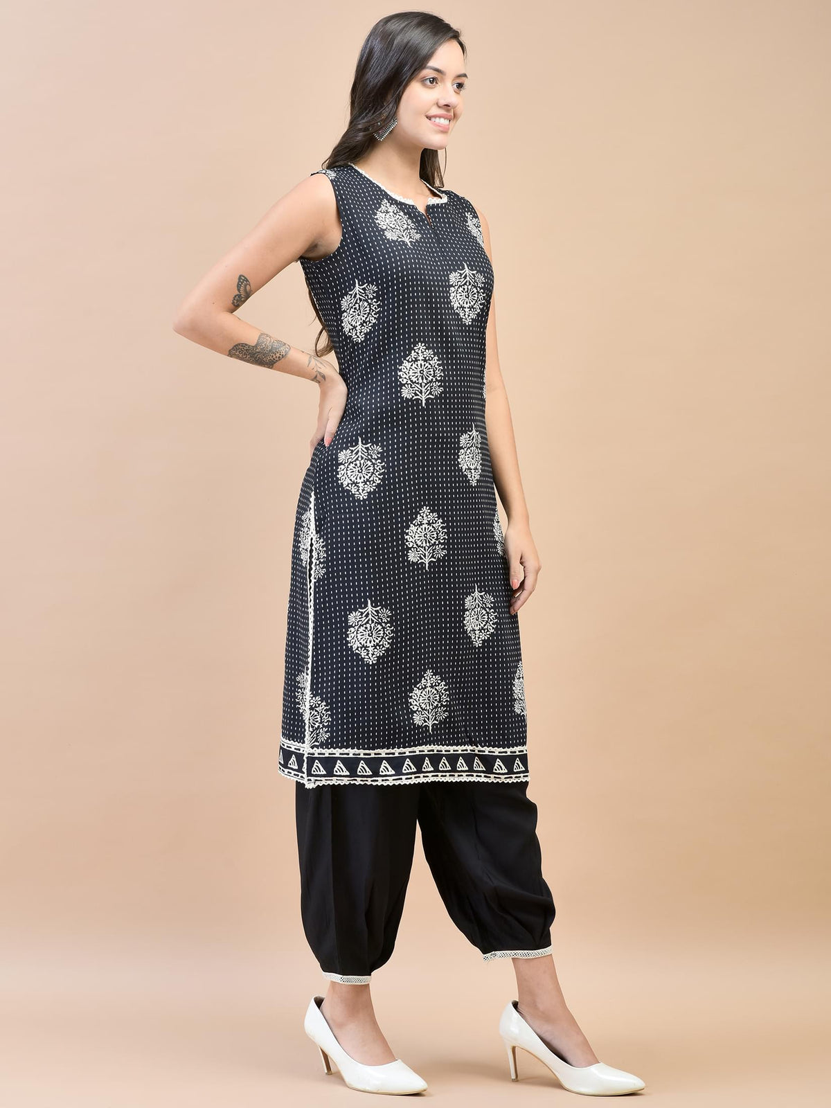 Women Liva (Rayon) Black Floral Print Kurta With Harem Pant.