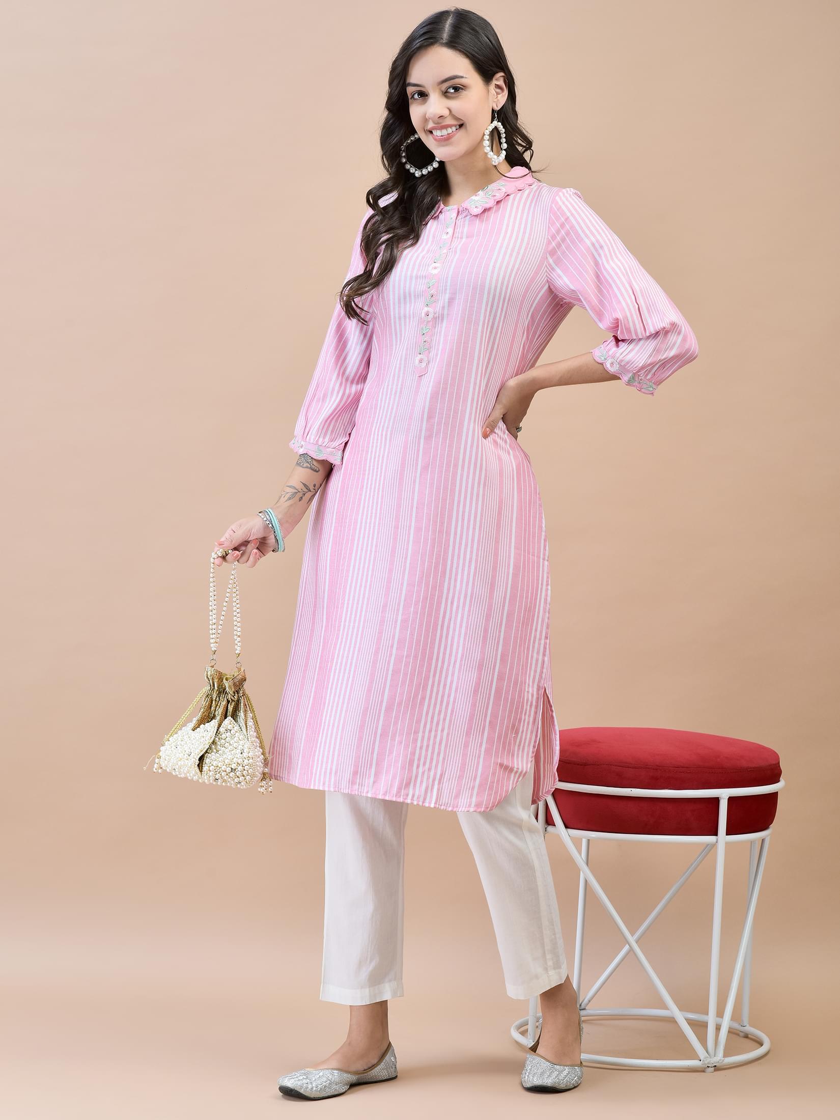 Women Liva (Rayon) Pink Embroidered Kurta.