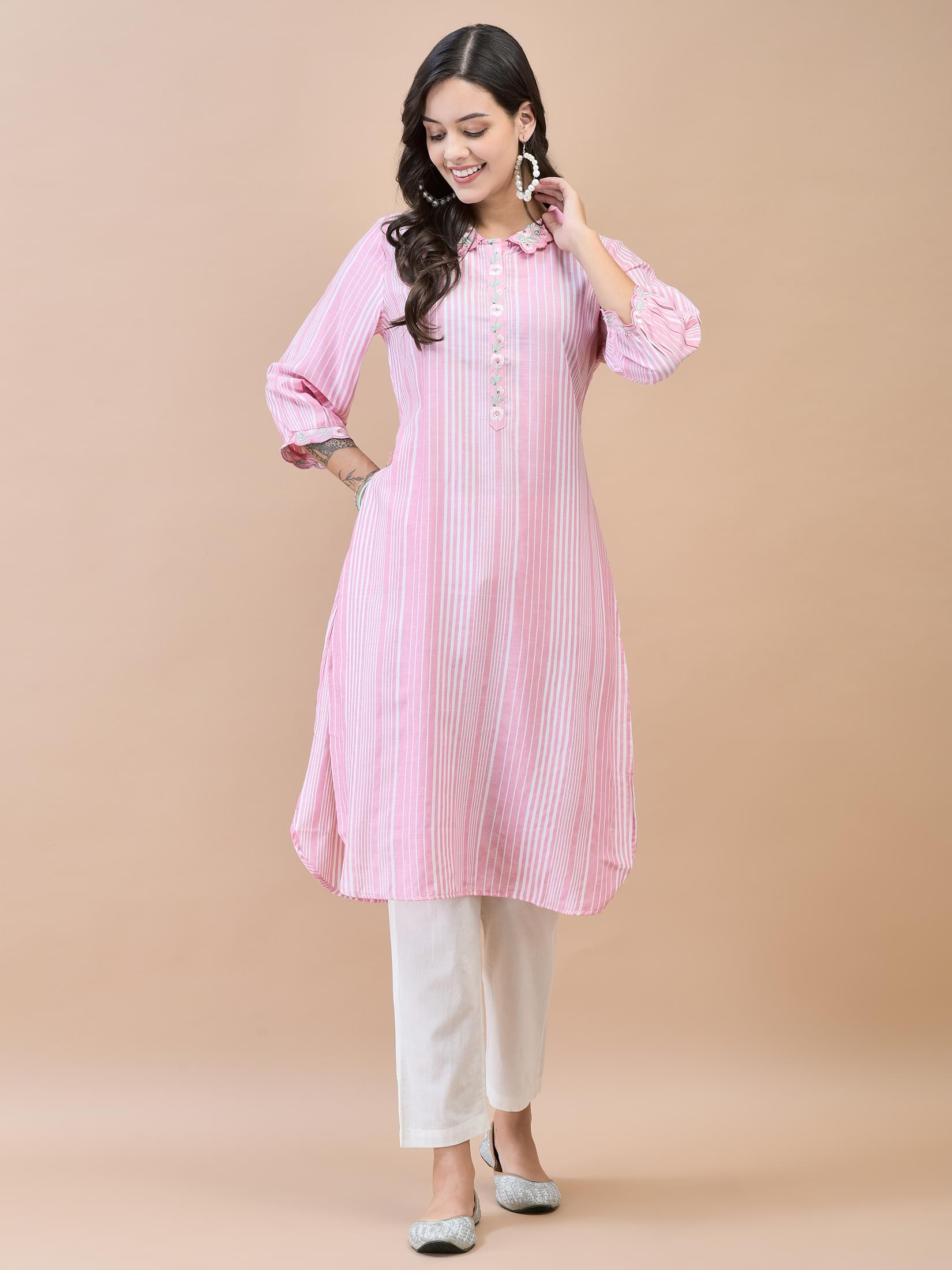 Women Liva (Rayon) Pink Embroidered Kurta.