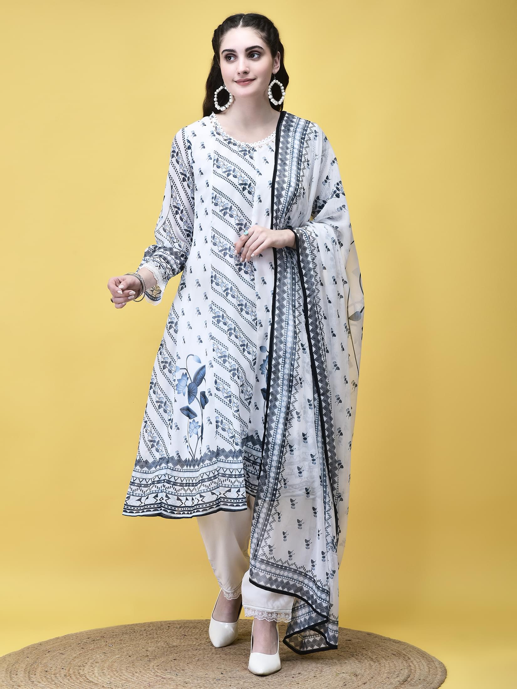 Pristine white and navy blue floral trail georgette elegant trousers dupatta suit