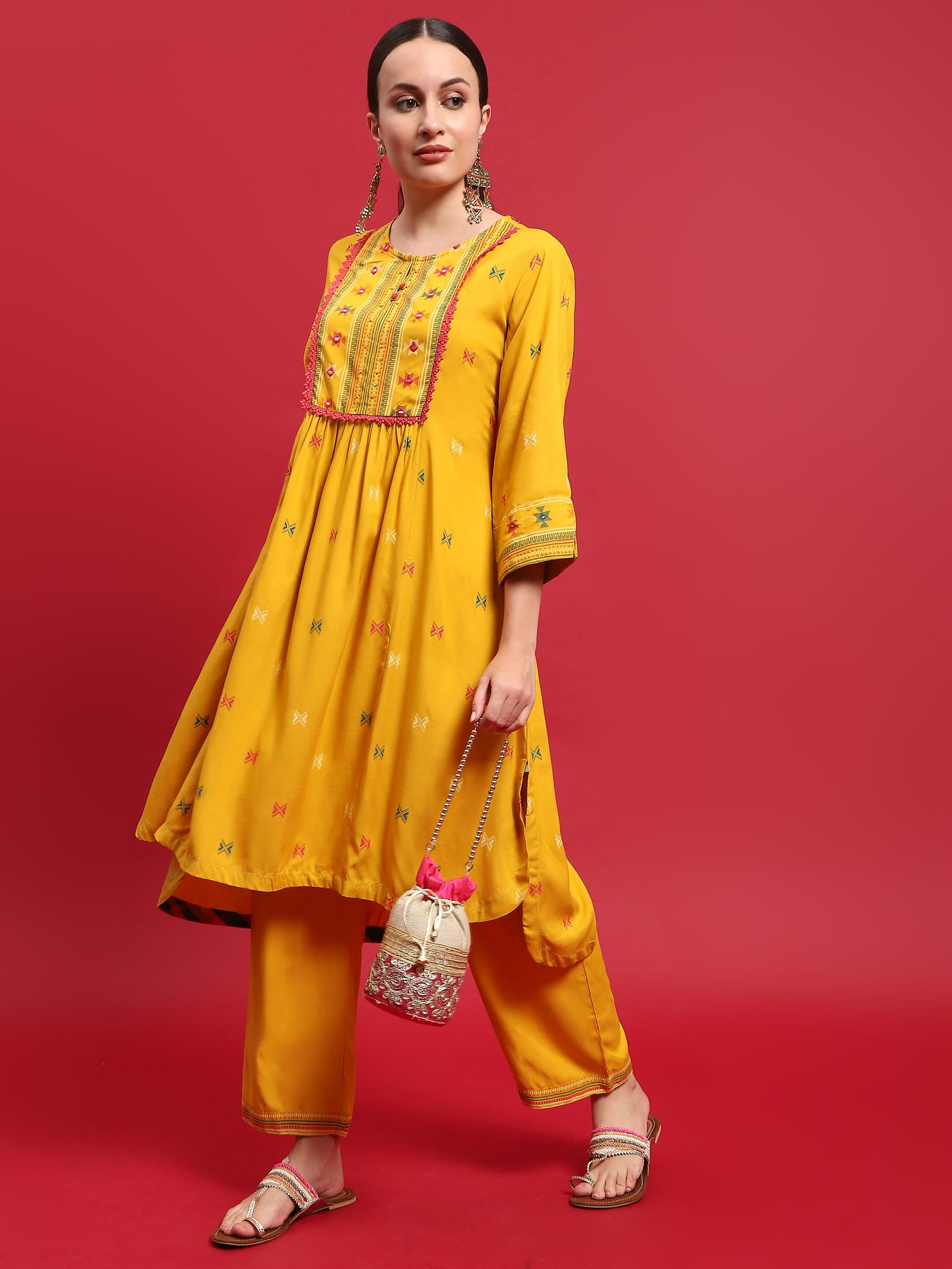 Women Liva Rayon Mustard Geometric Print Kurta With Comfort Pant.