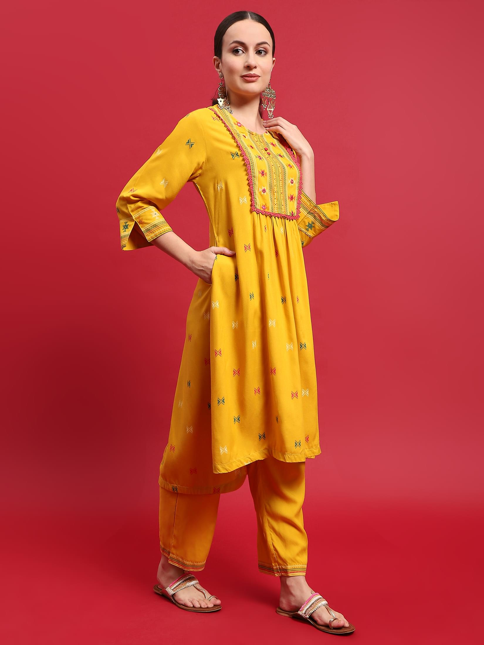 Women Liva Rayon Mustard Geometric Print Kurta With Comfort Pant.
