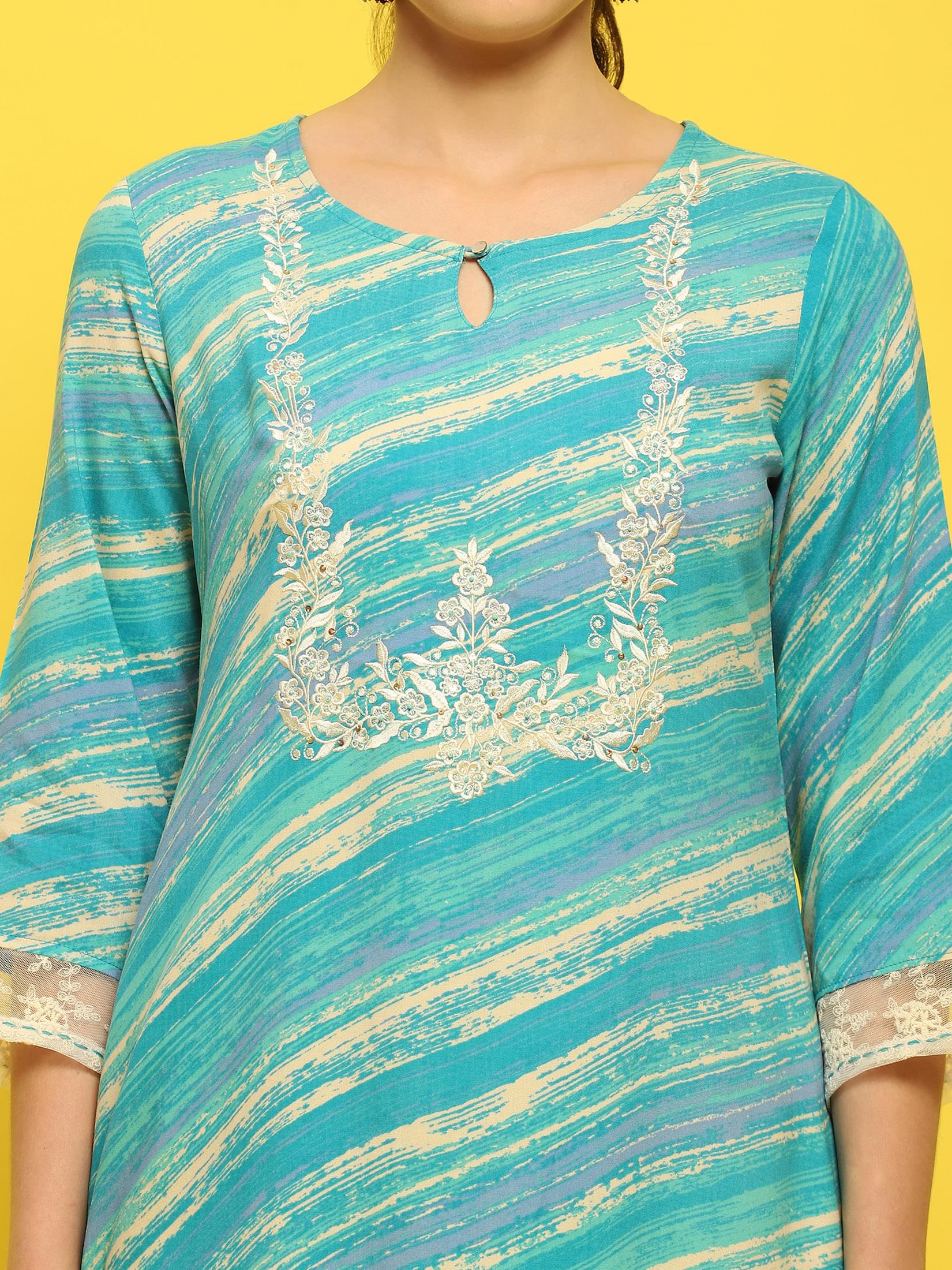 Women Liva Rayon Blue Embroidered Kurta.