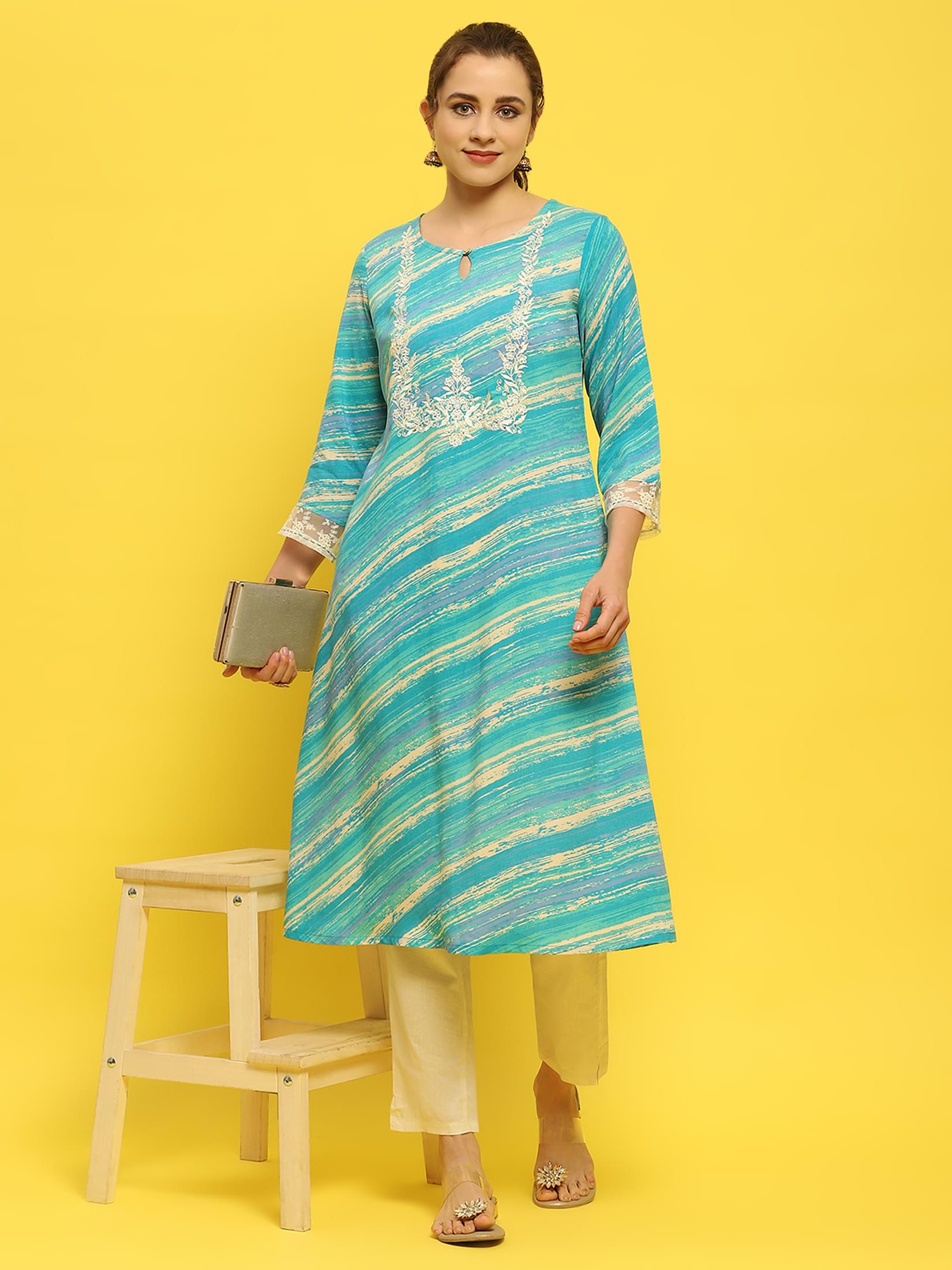 Women Liva Rayon Blue Embroidered Kurta.