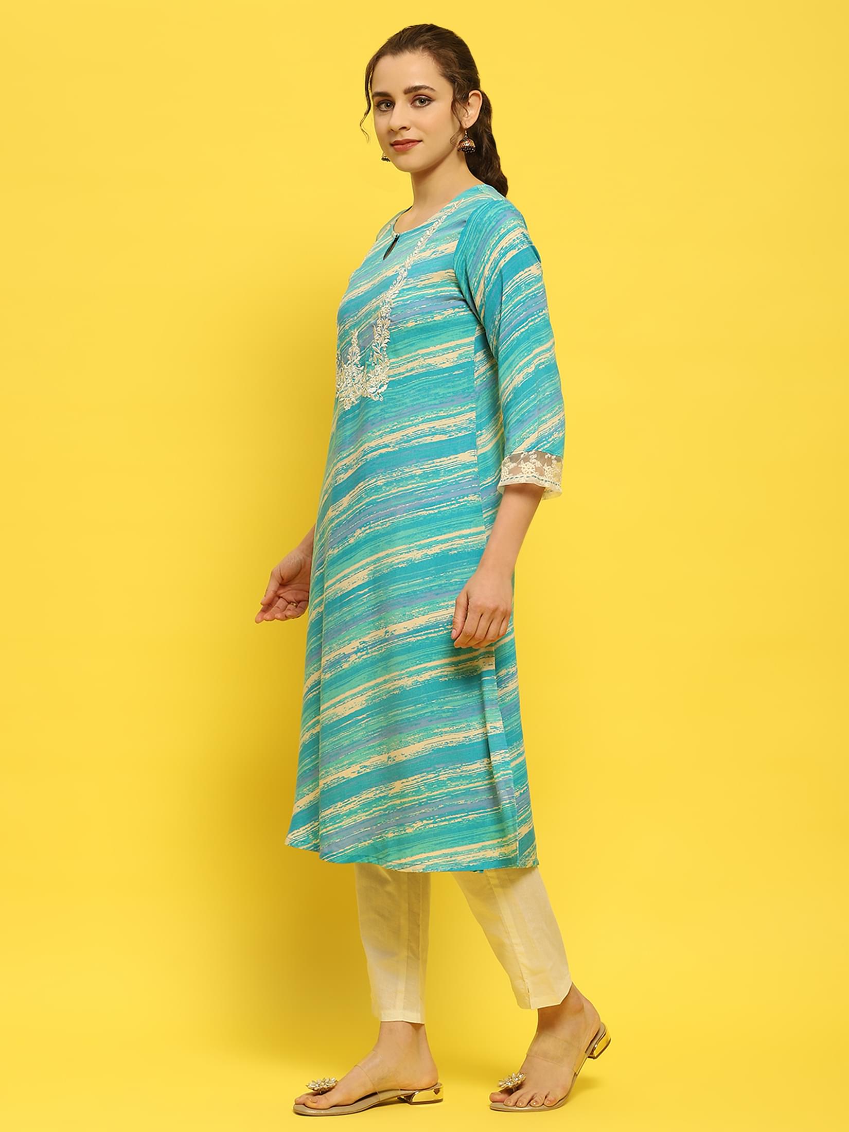 Women Liva Rayon Blue Embroidered Kurta.