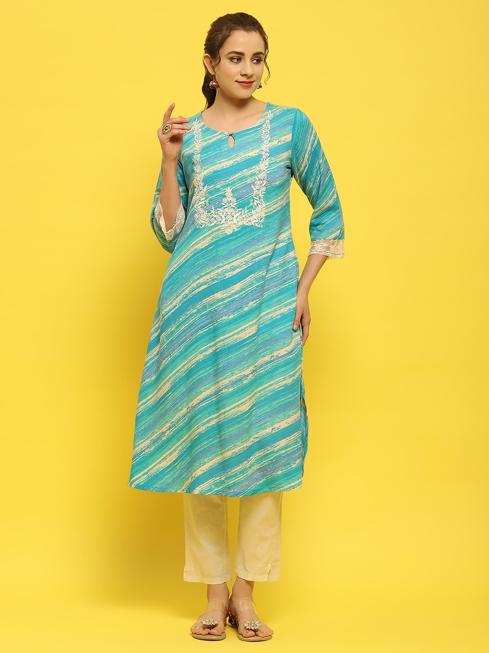 Women Liva Rayon Blue Embroidered Kurta.