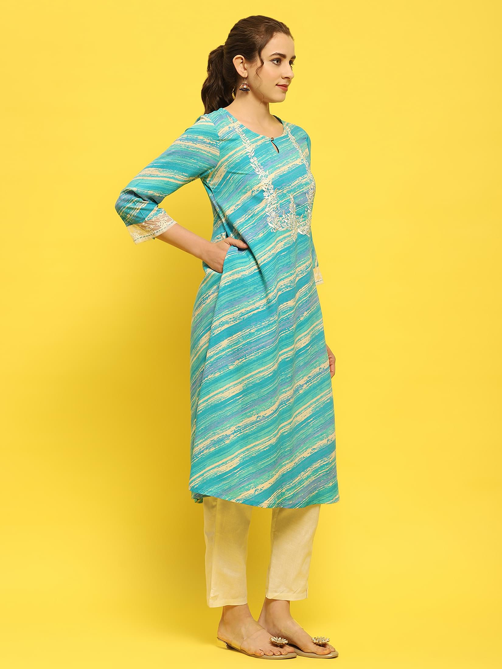 Women Liva Rayon Blue Embroidered Kurta.