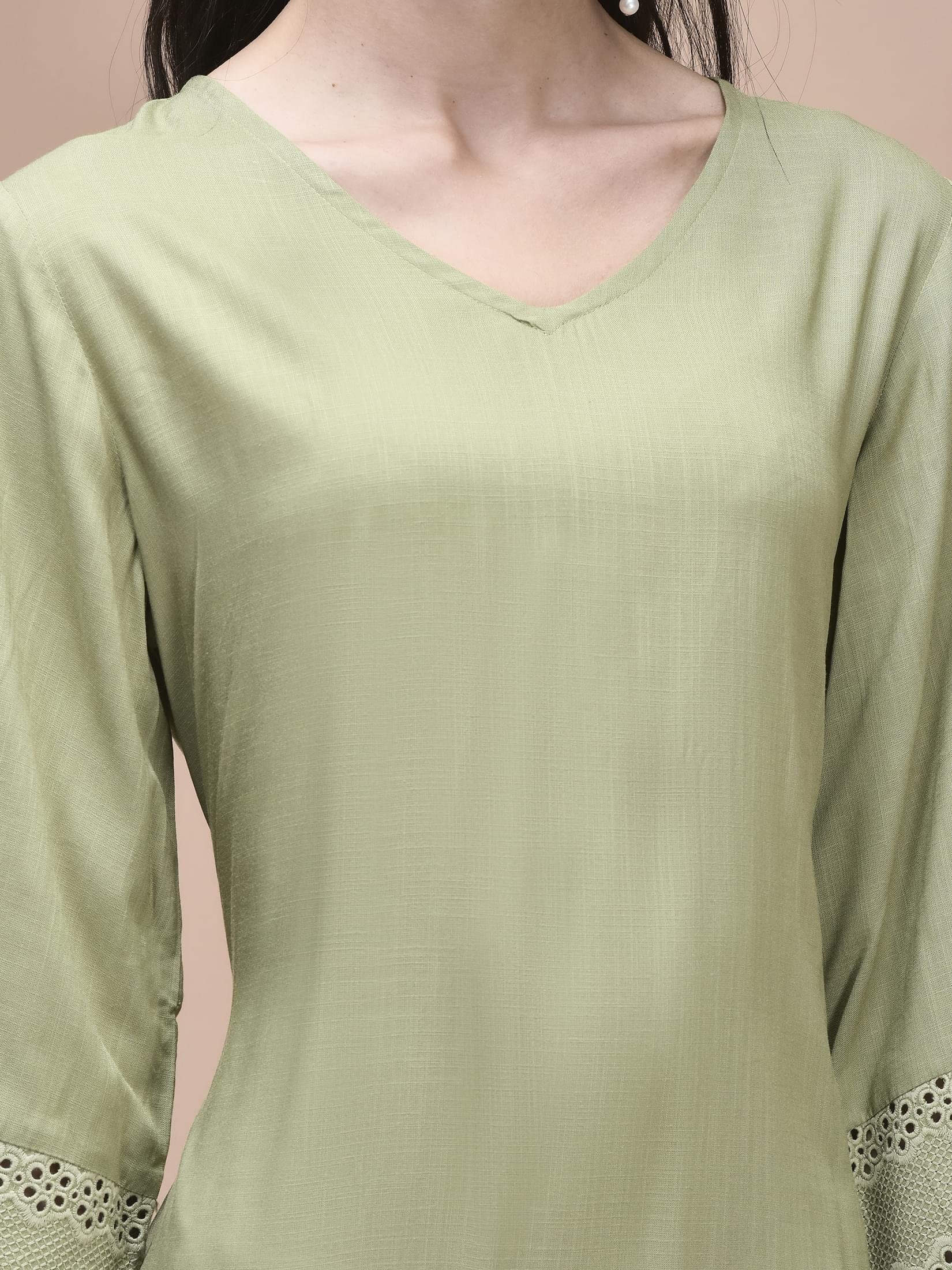 Women Liva Green Embroidered Kurta.