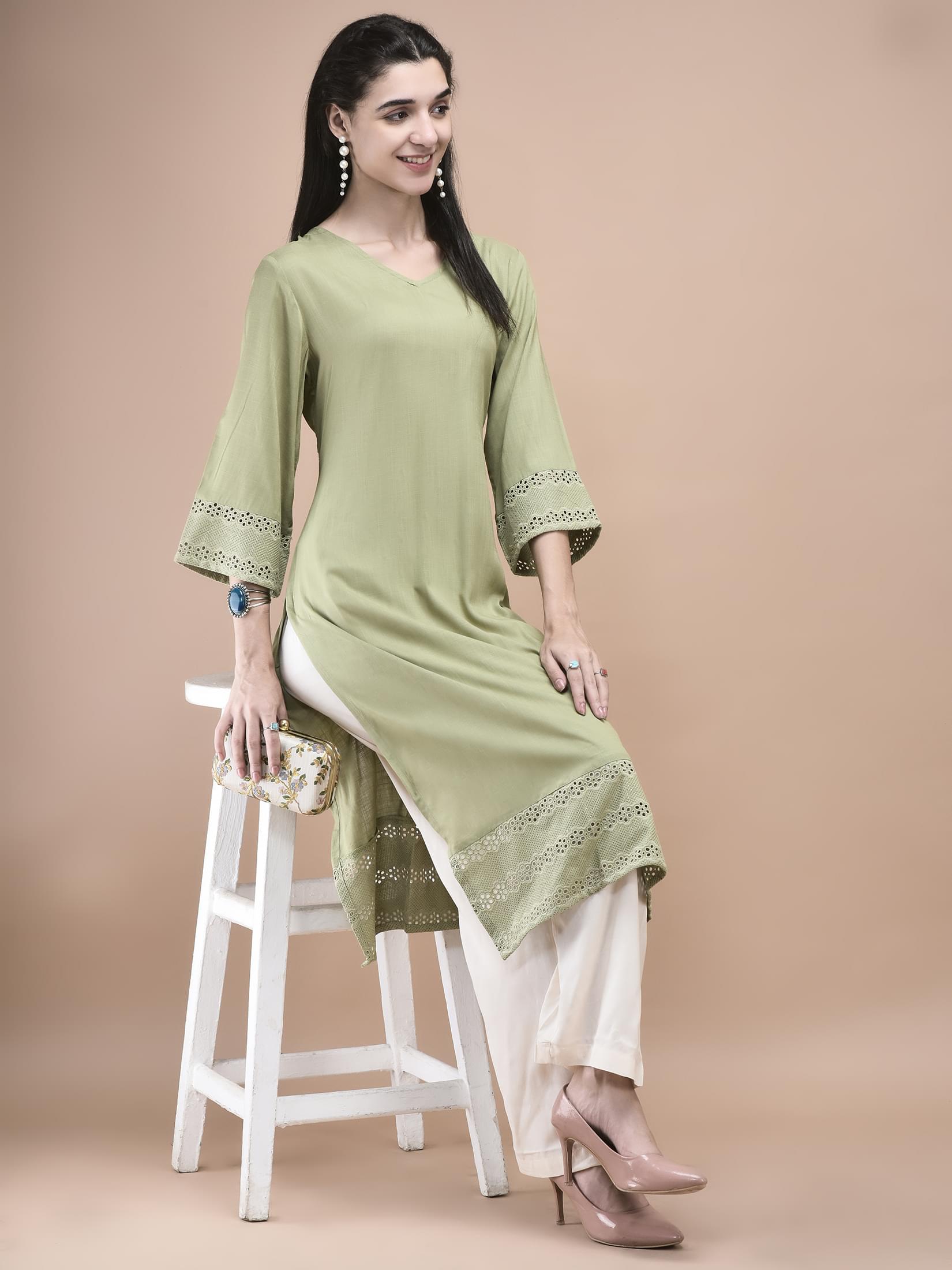 Women Liva Green Embroidered Kurta.