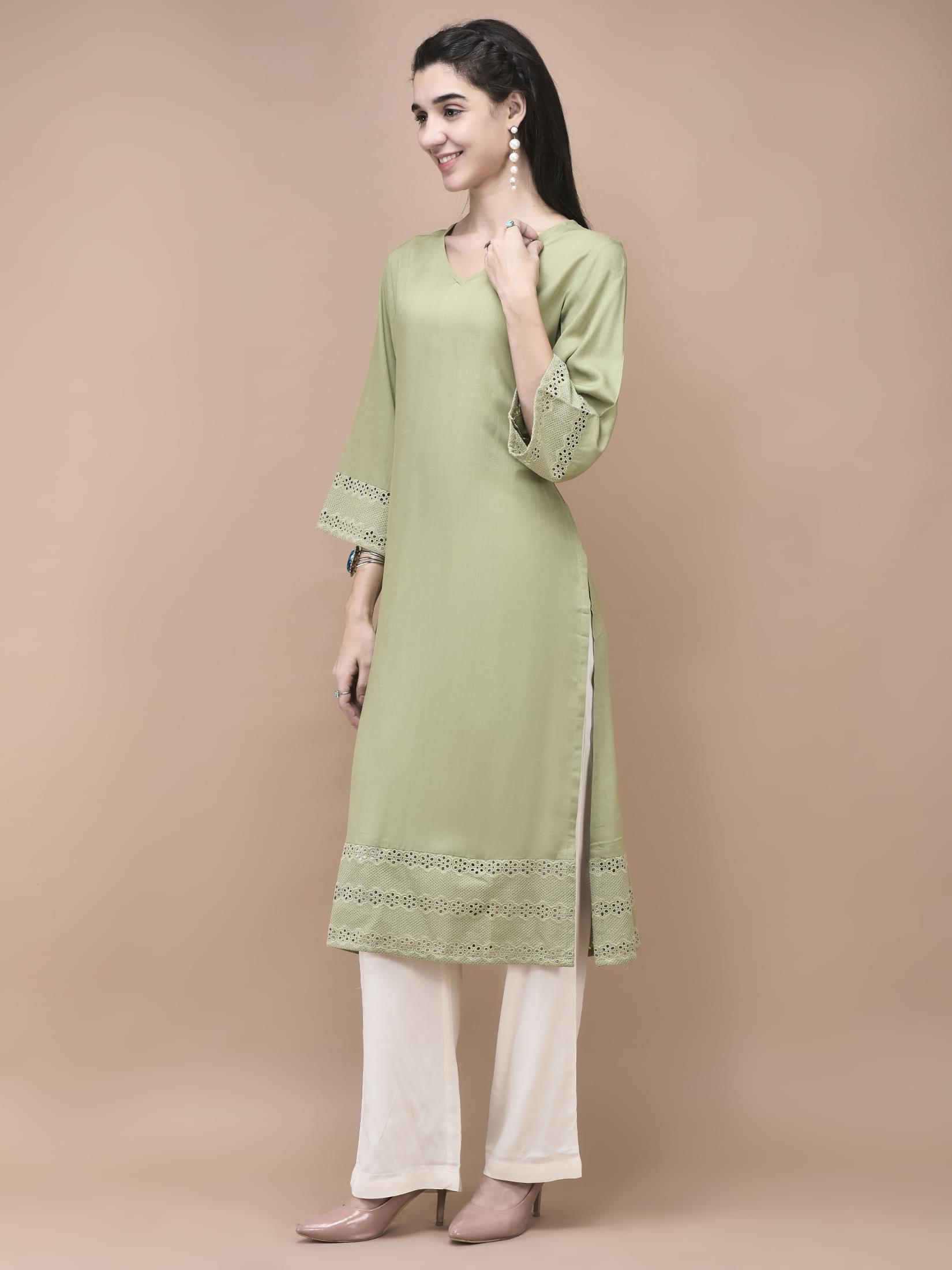 Women Liva Green Embroidered Kurta.