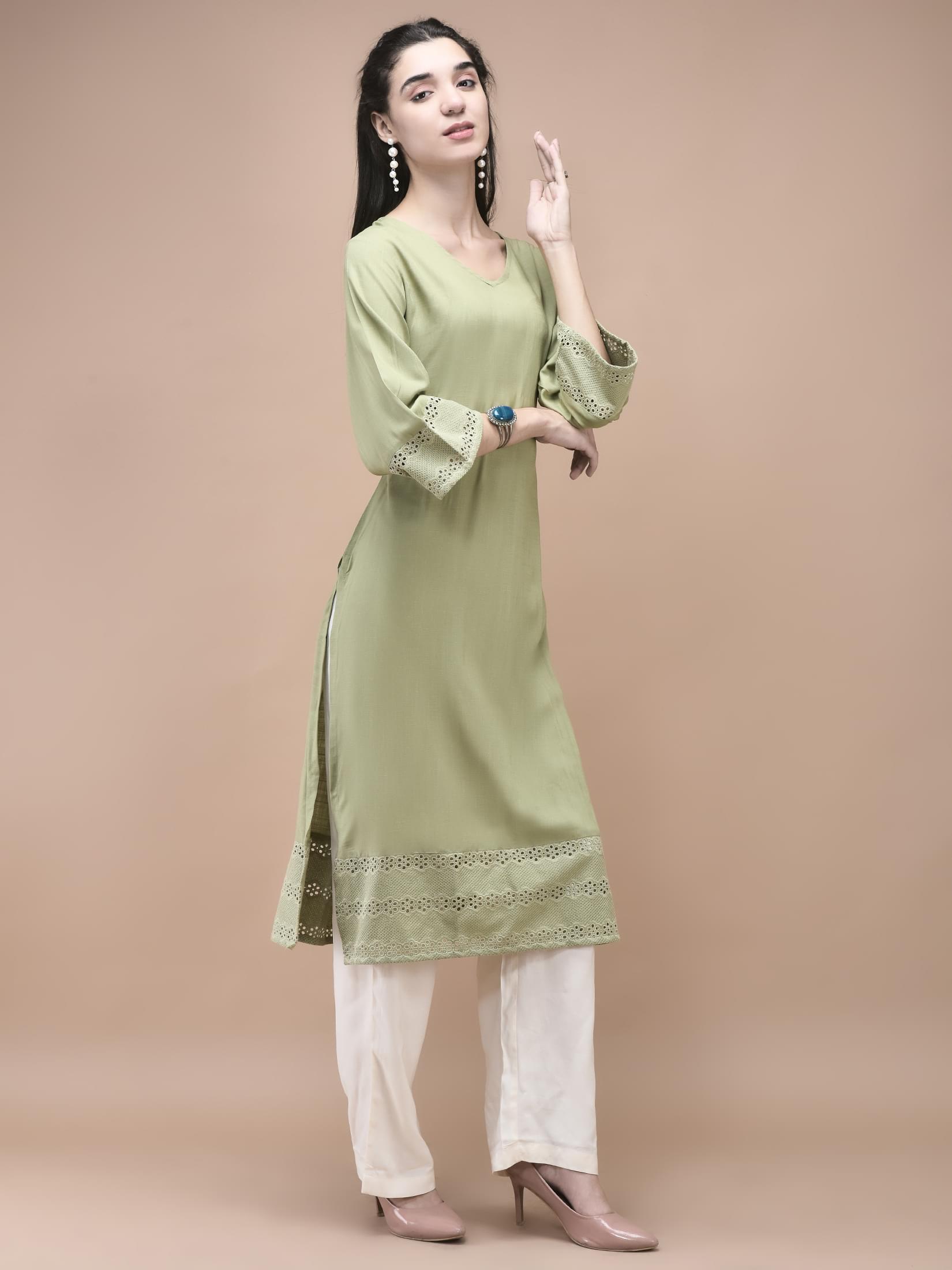 Women Liva Green Embroidered Kurta.