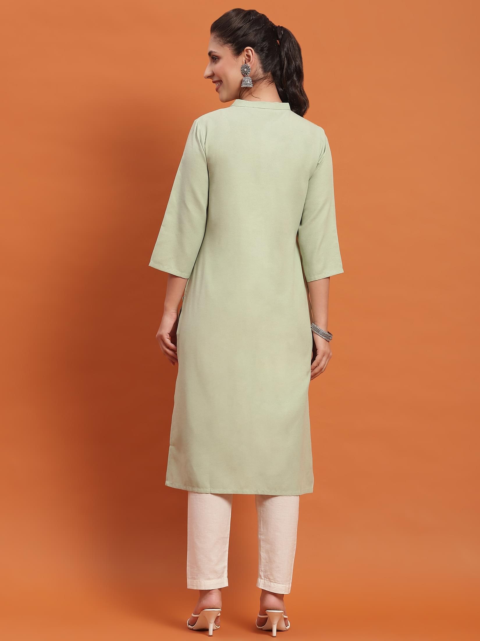 Women Green Solid Kurta.