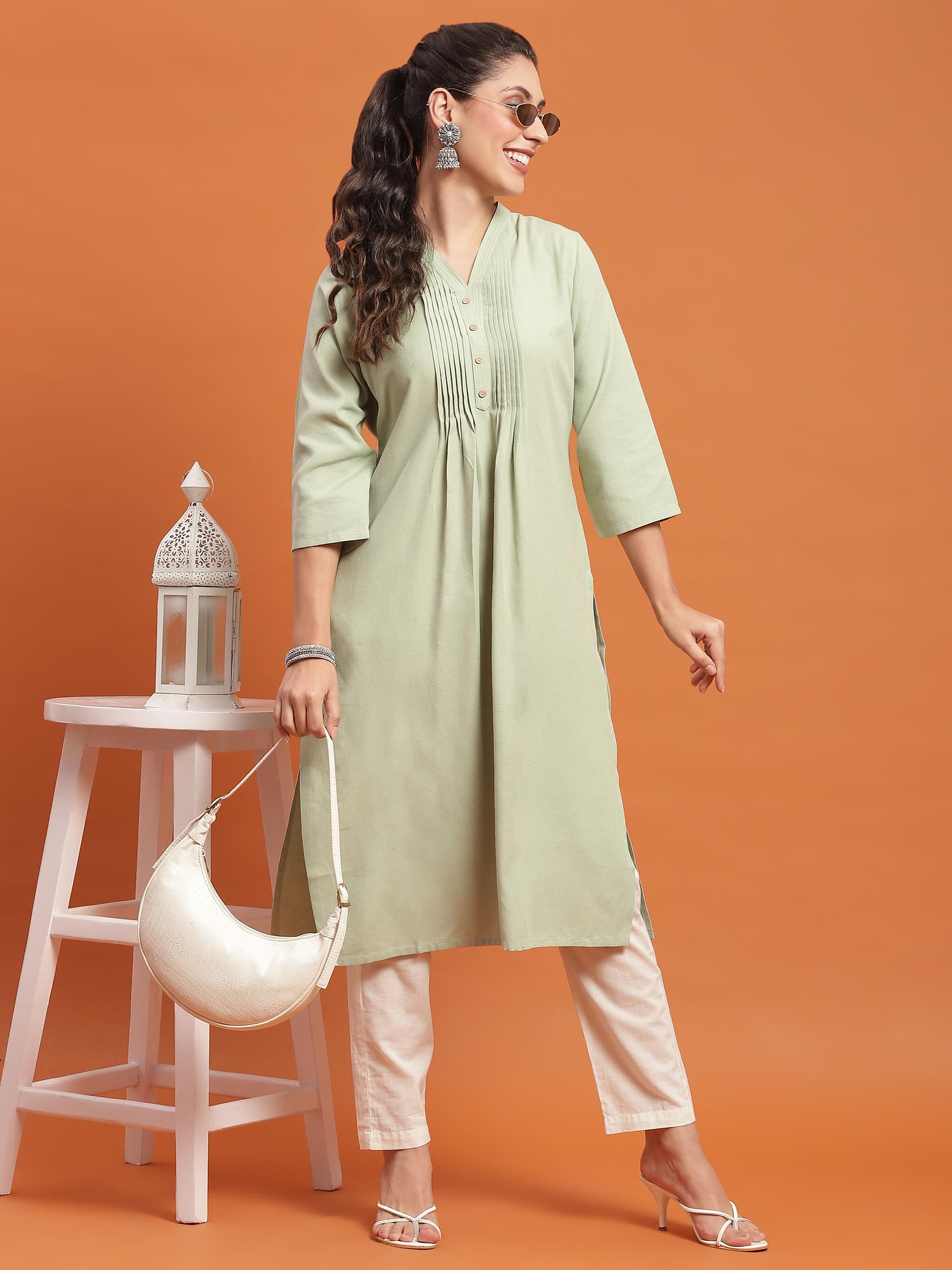 Women Green Solid Kurta.
