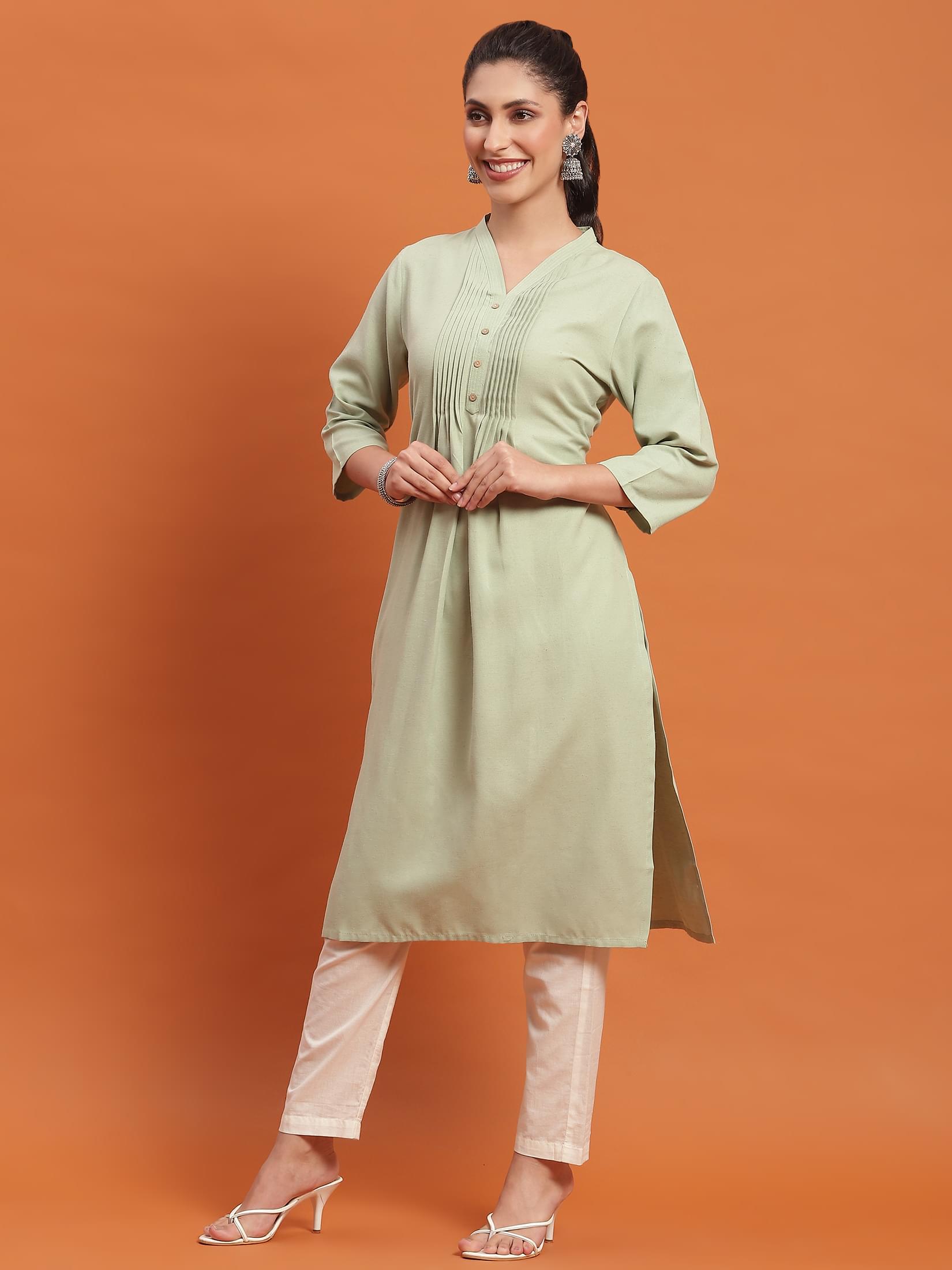 Women Green Solid Kurta.