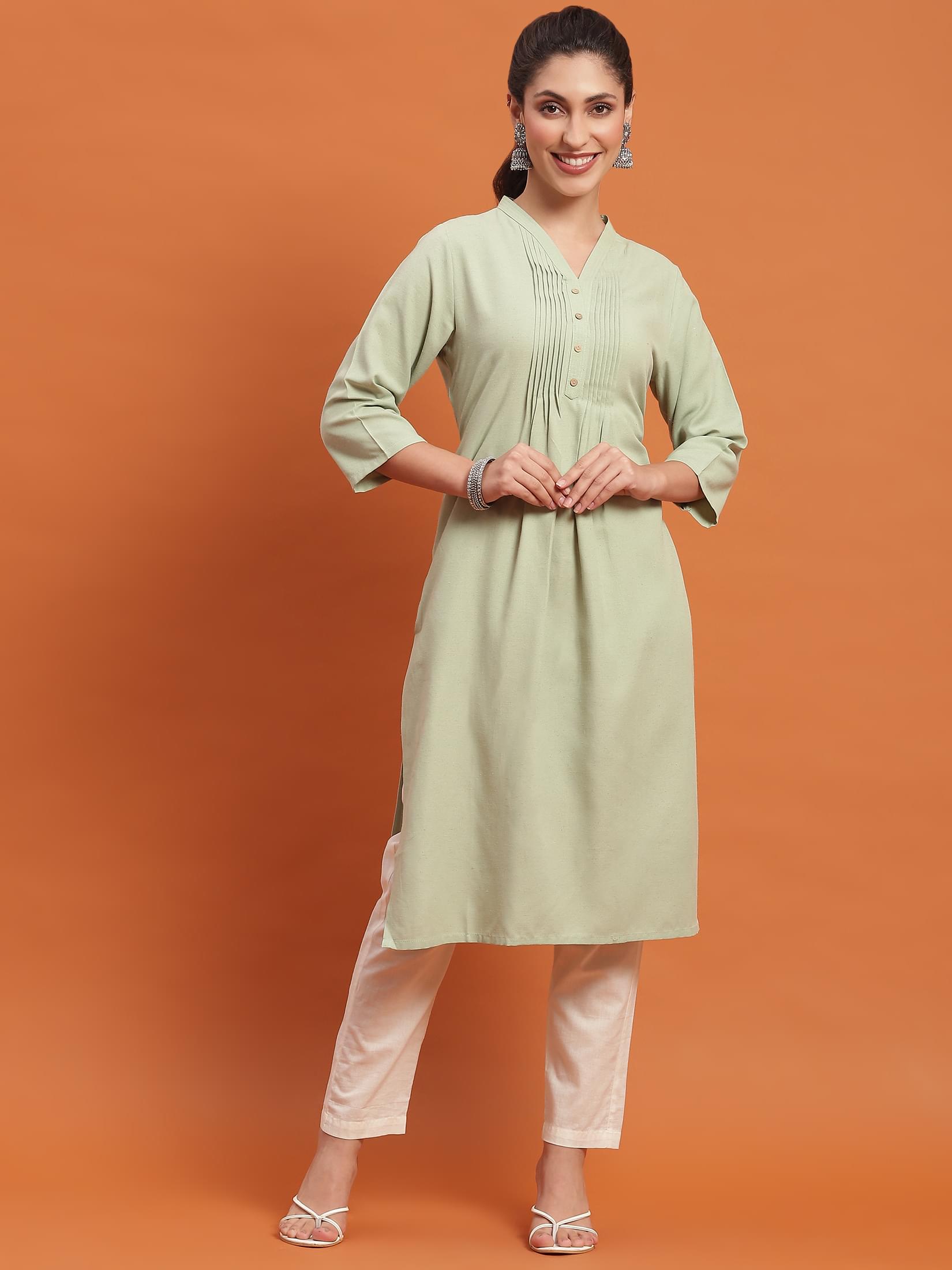Women Green Solid Kurta.