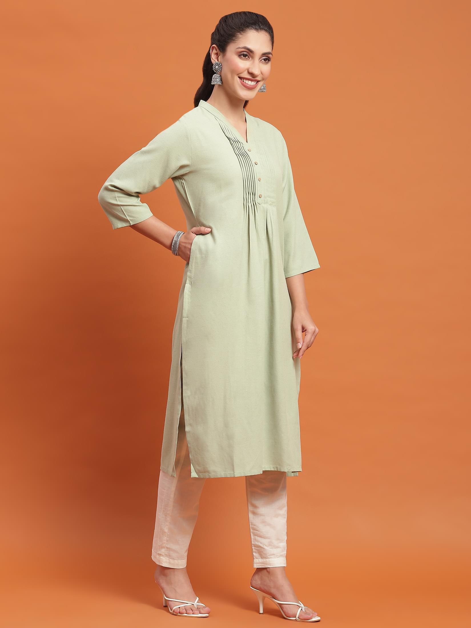 Women Green Solid Kurta.