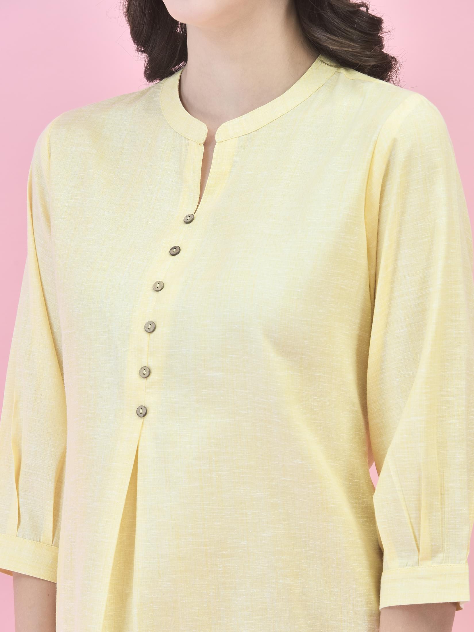 Women Cotton Yellow Solid Kurta.