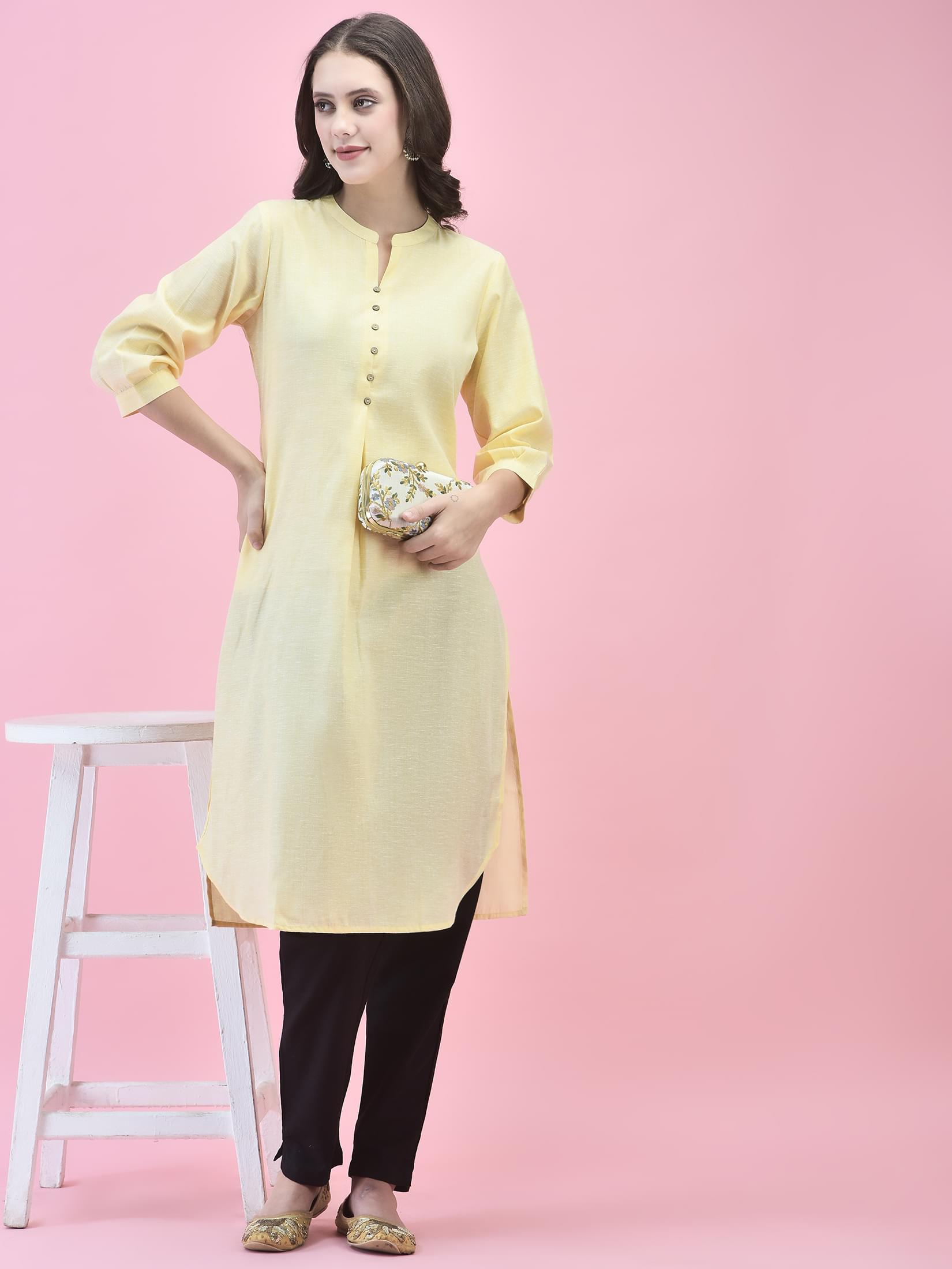 Women Cotton Yellow Solid Kurta.