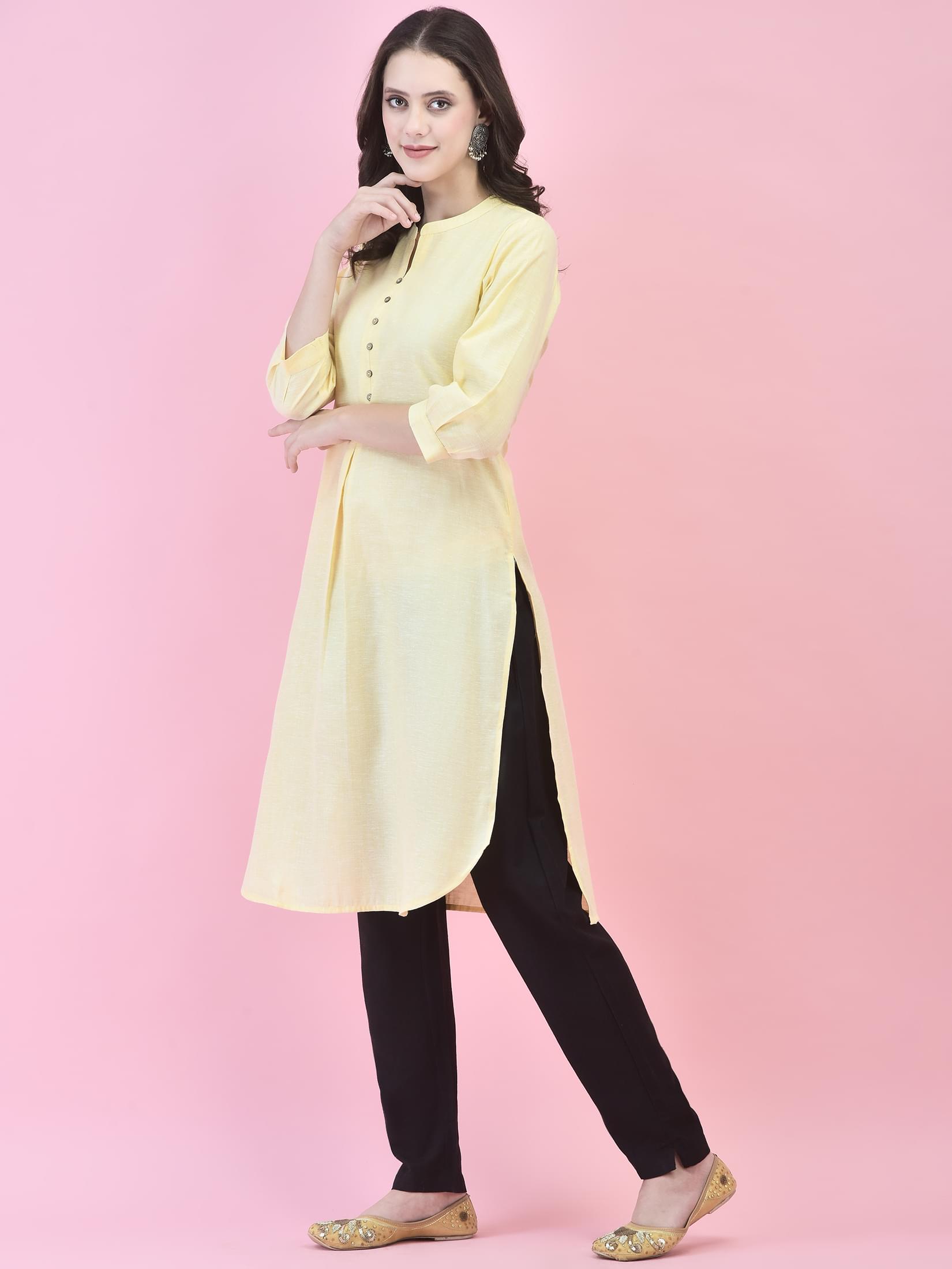 Women Cotton Yellow Solid Kurta.
