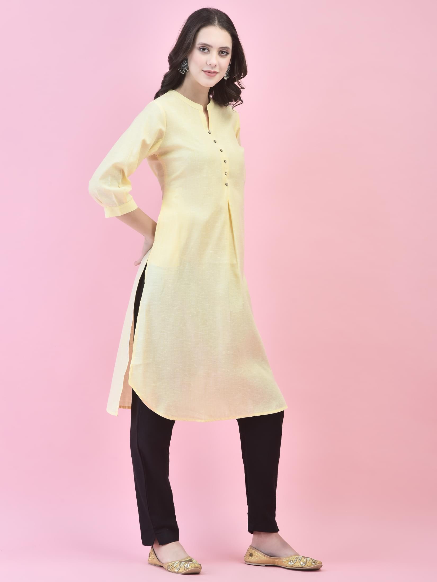 Women Cotton Yellow Solid Kurta.
