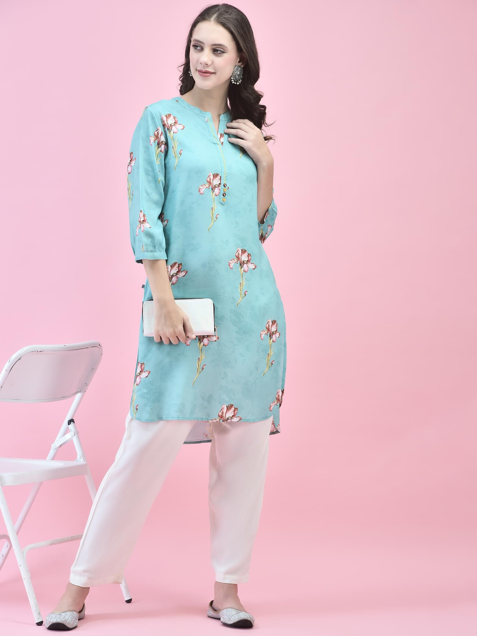 Women Liva (Rayon) Blue Floral Print Kurti.