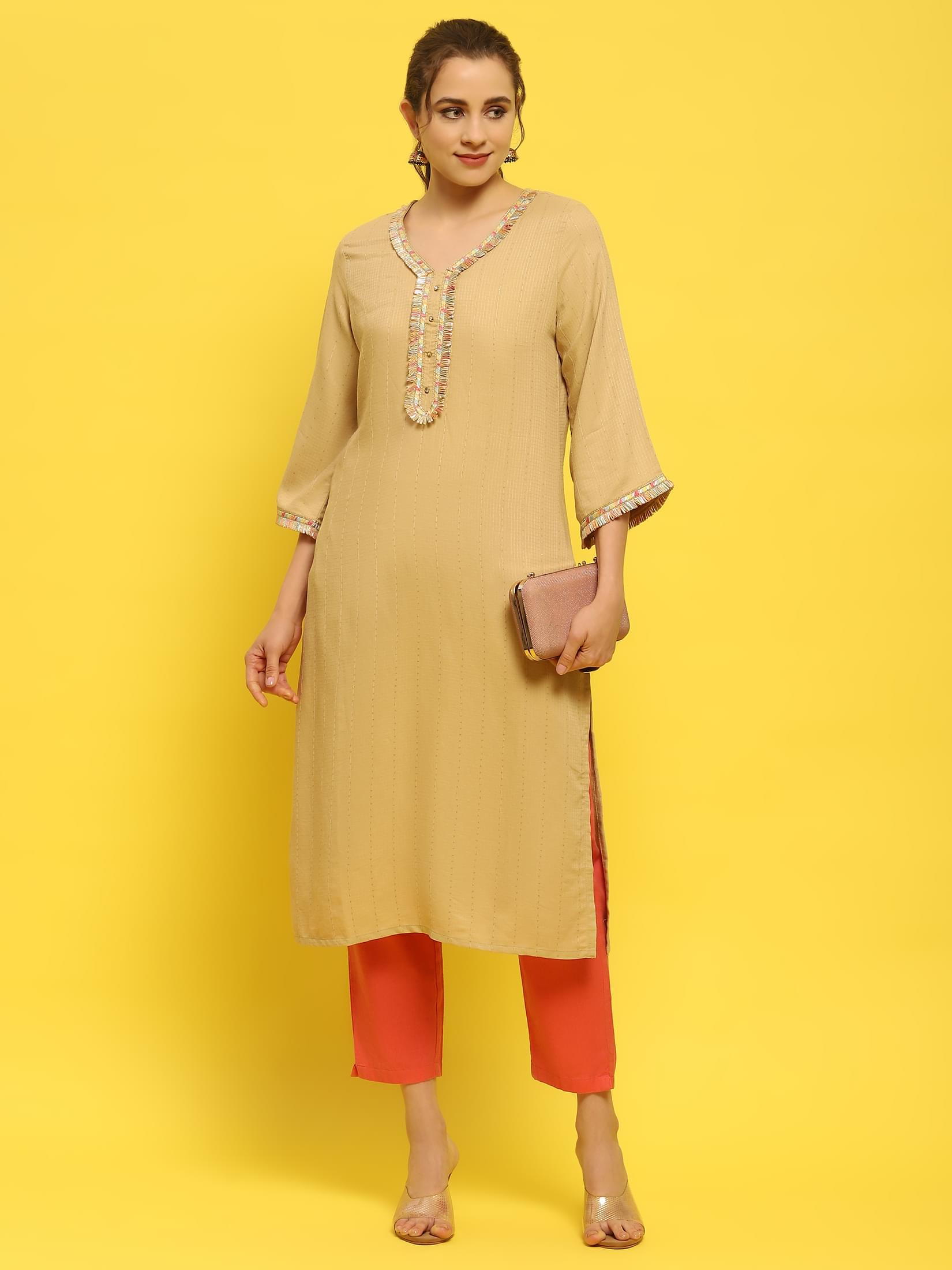 Women Poly Viscose Beige Solid Kurta.