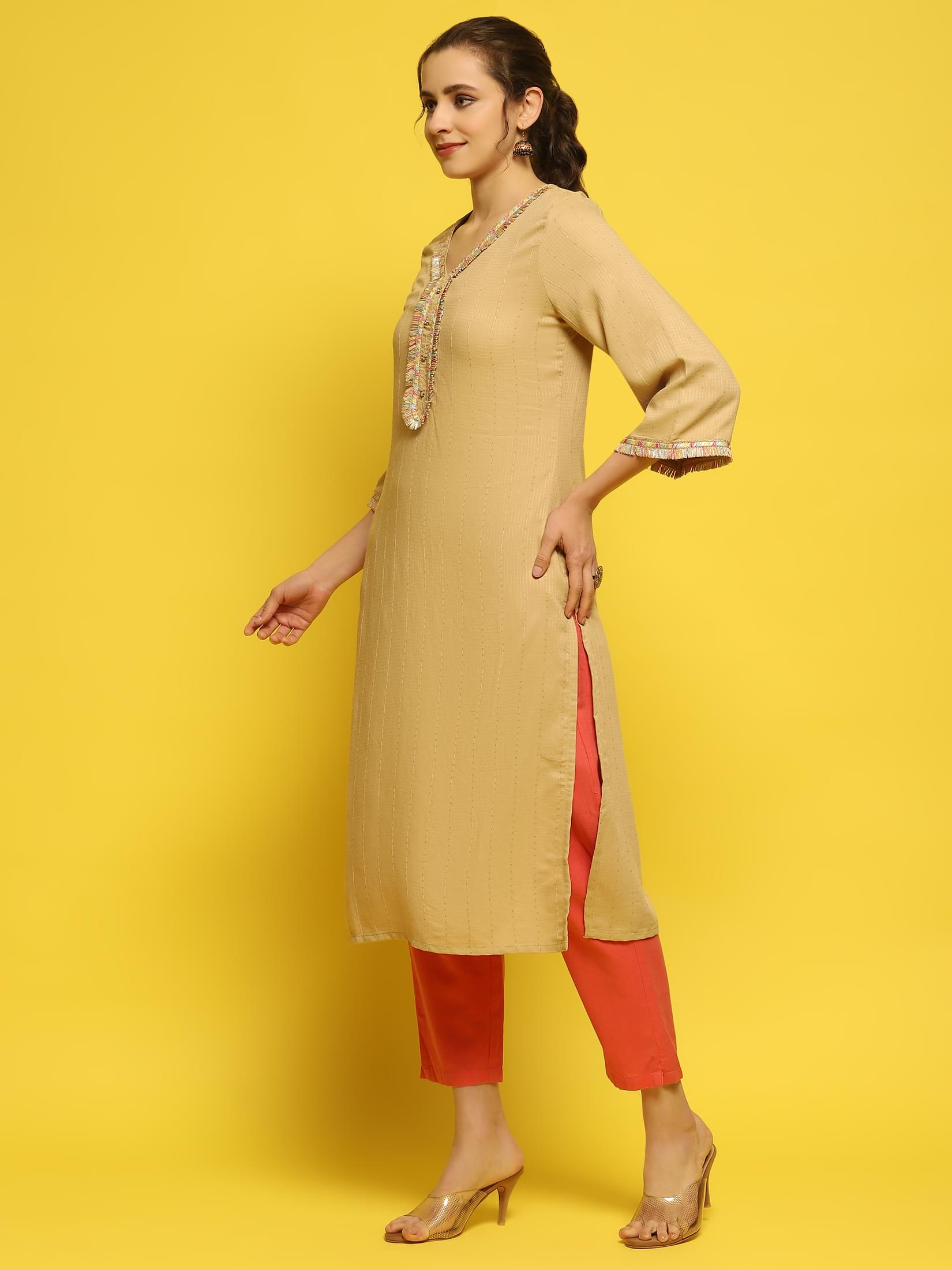 Women Poly Viscose Beige Solid Kurta.