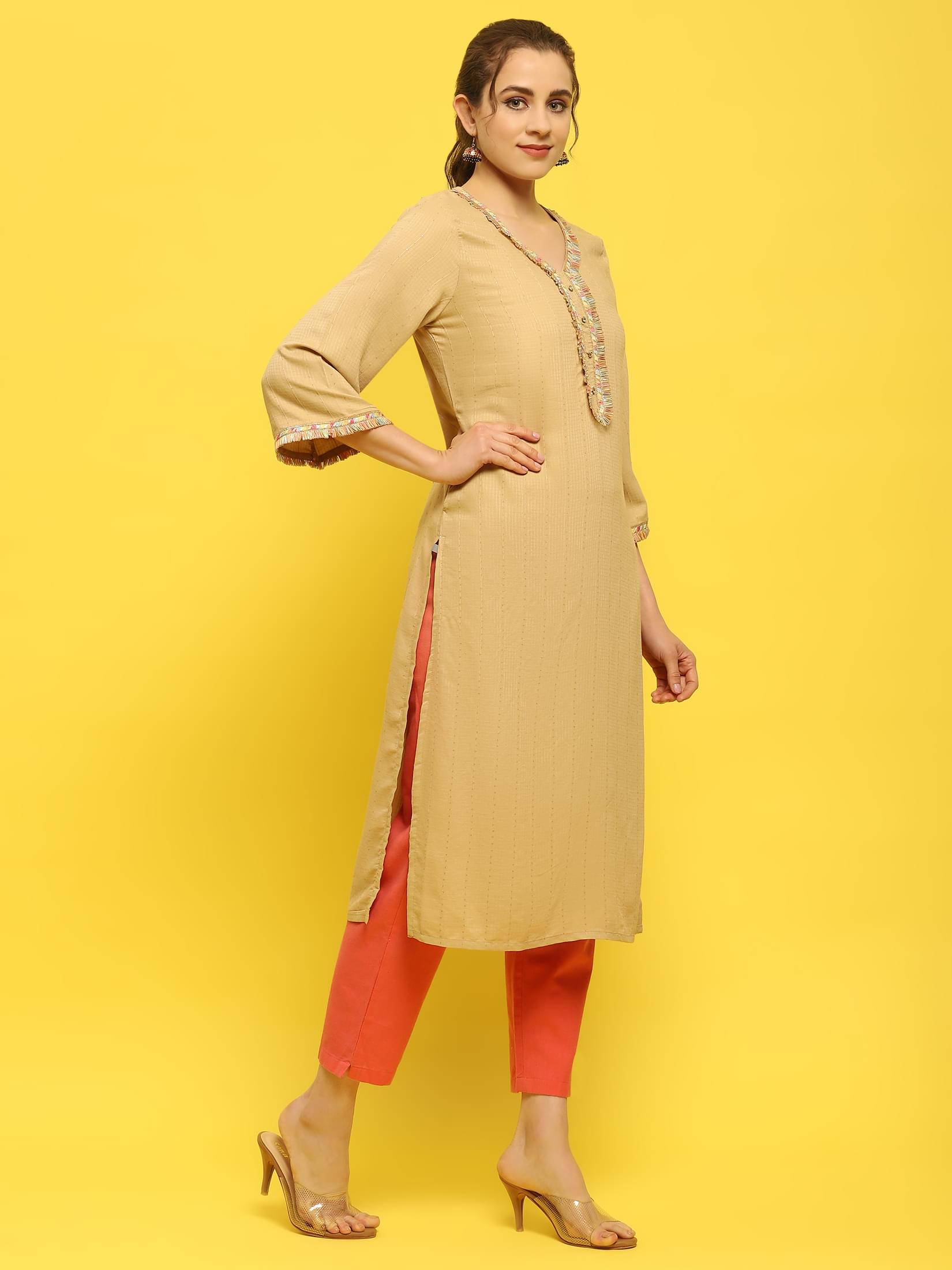 Women Poly Viscose Beige Solid Kurta.
