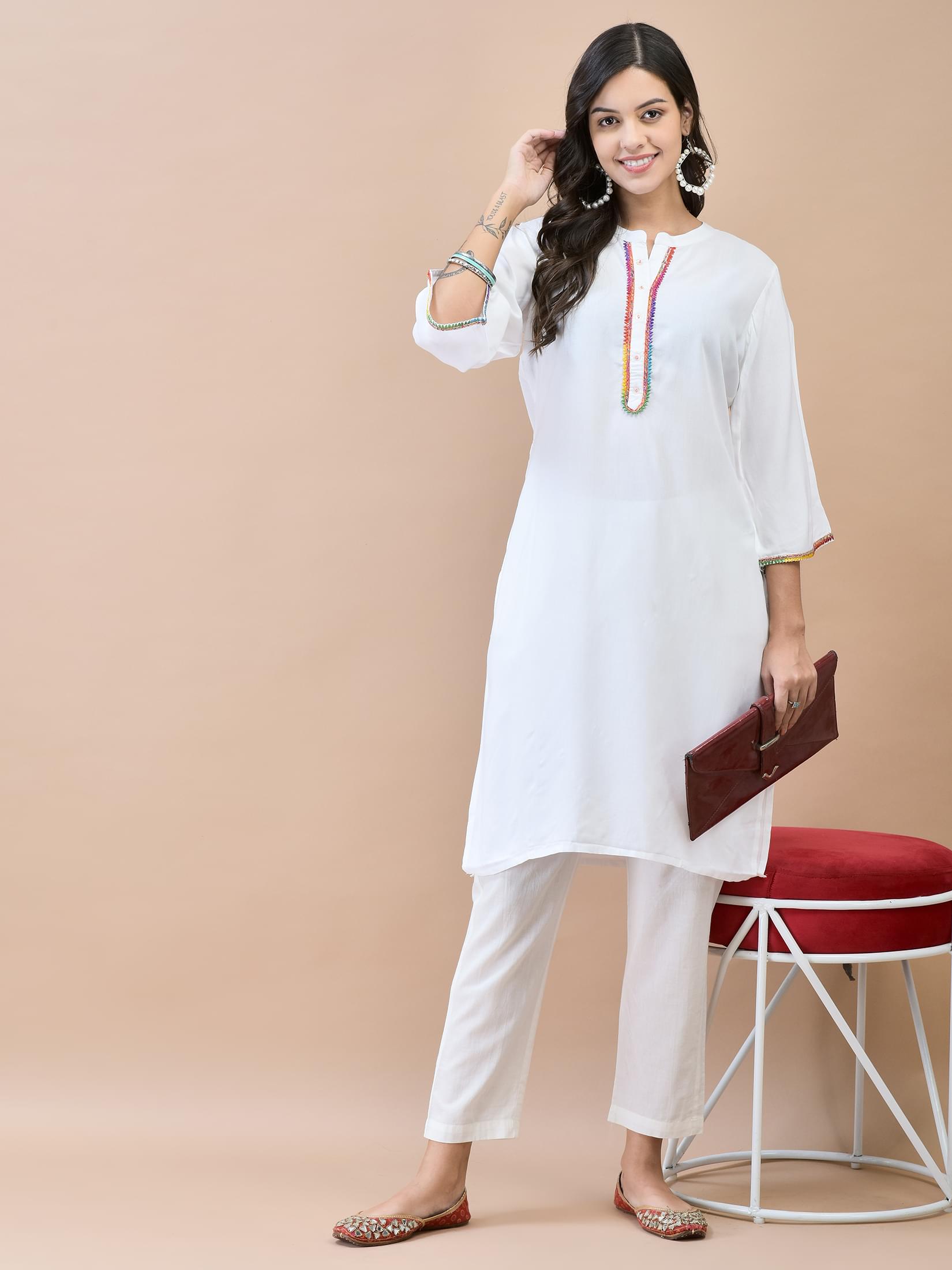 Women Liva (Rayon) White Solid Kurta.
