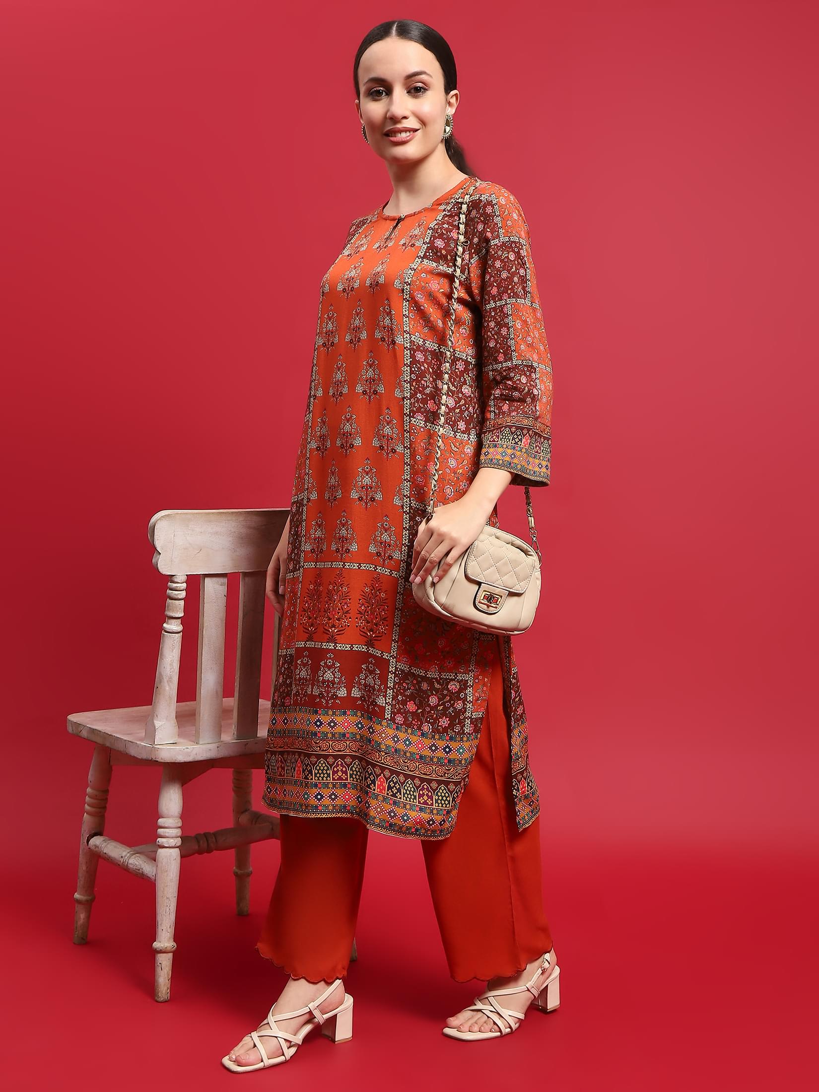 Women Liva Rayon Orange Floral Print Kurta With Comfort Pant.